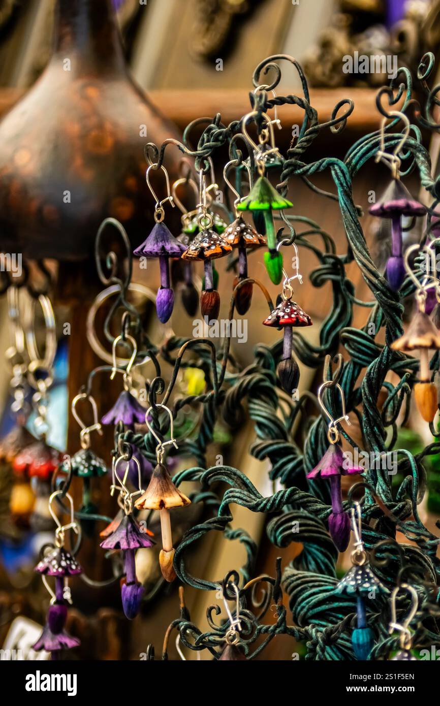 Feira da Ladra, Lisbon's flea market in Campo de Santa Clara, highlights handcrafted mushroom earrings, a charming addition to any collection. Stock Photo