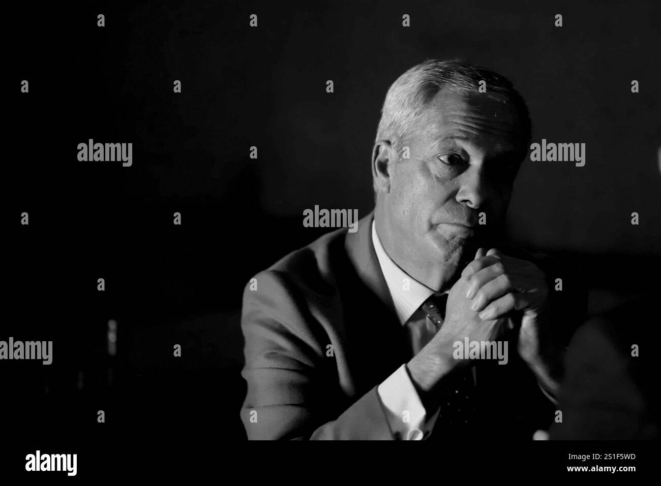 IMAGE CONVERTED TO BLACK AND WHITE Reform UK leader Nigel Farage doing