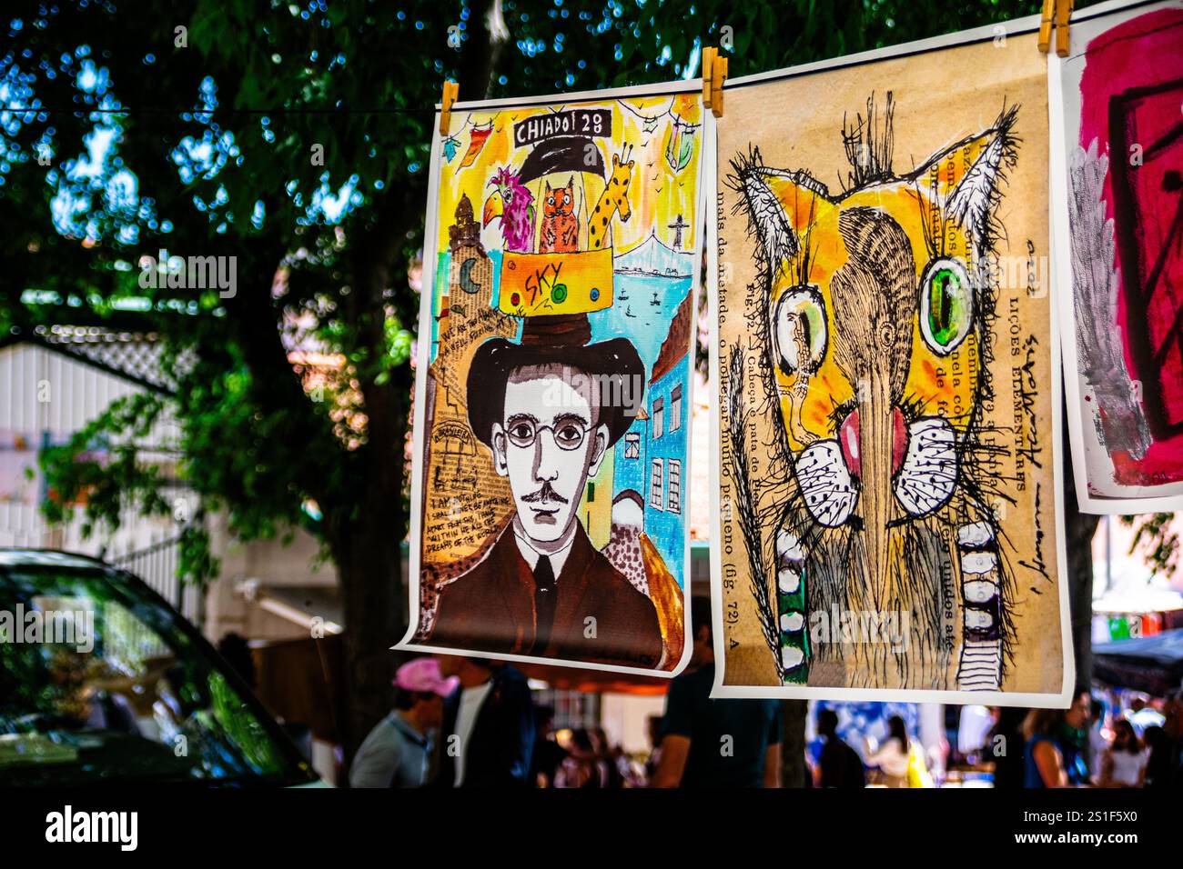 Feira da Ladra, Lisbon's flea market at Campo de Santa Clara, showcases posters, capturing Lisbon's iconic culture. Stock Photo