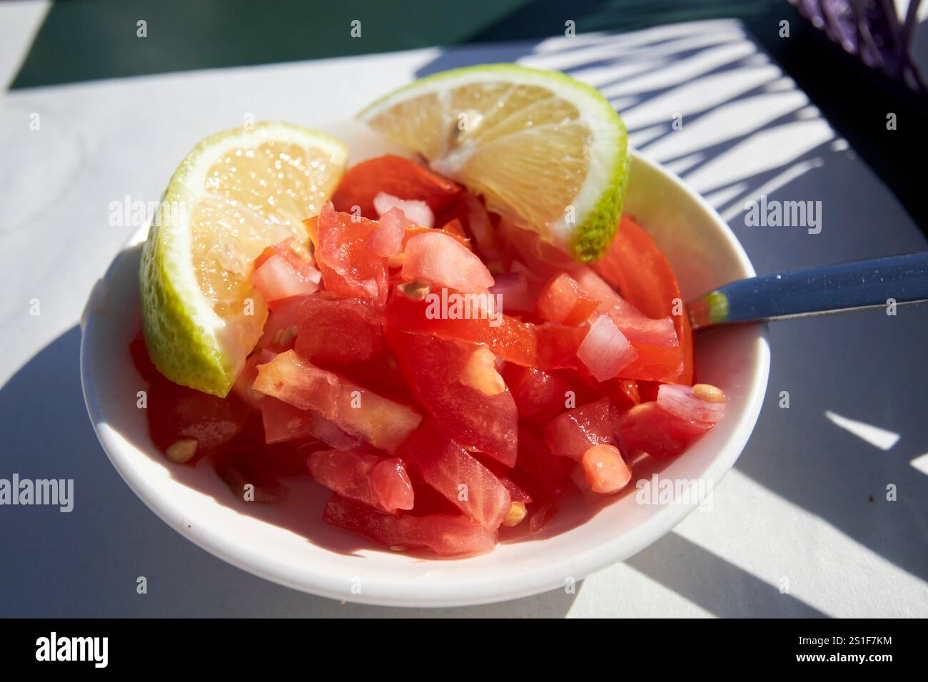 fresh moroccan salad of tomatoes onion lime essaouira port harbour, morocco Stock Photo