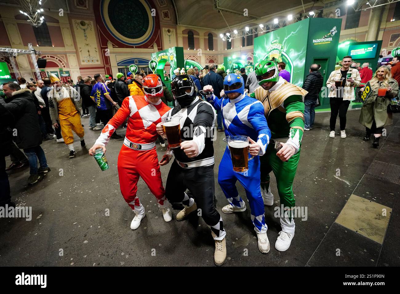 Darts fans in fancy dress ahead of the Paddy Power World Darts