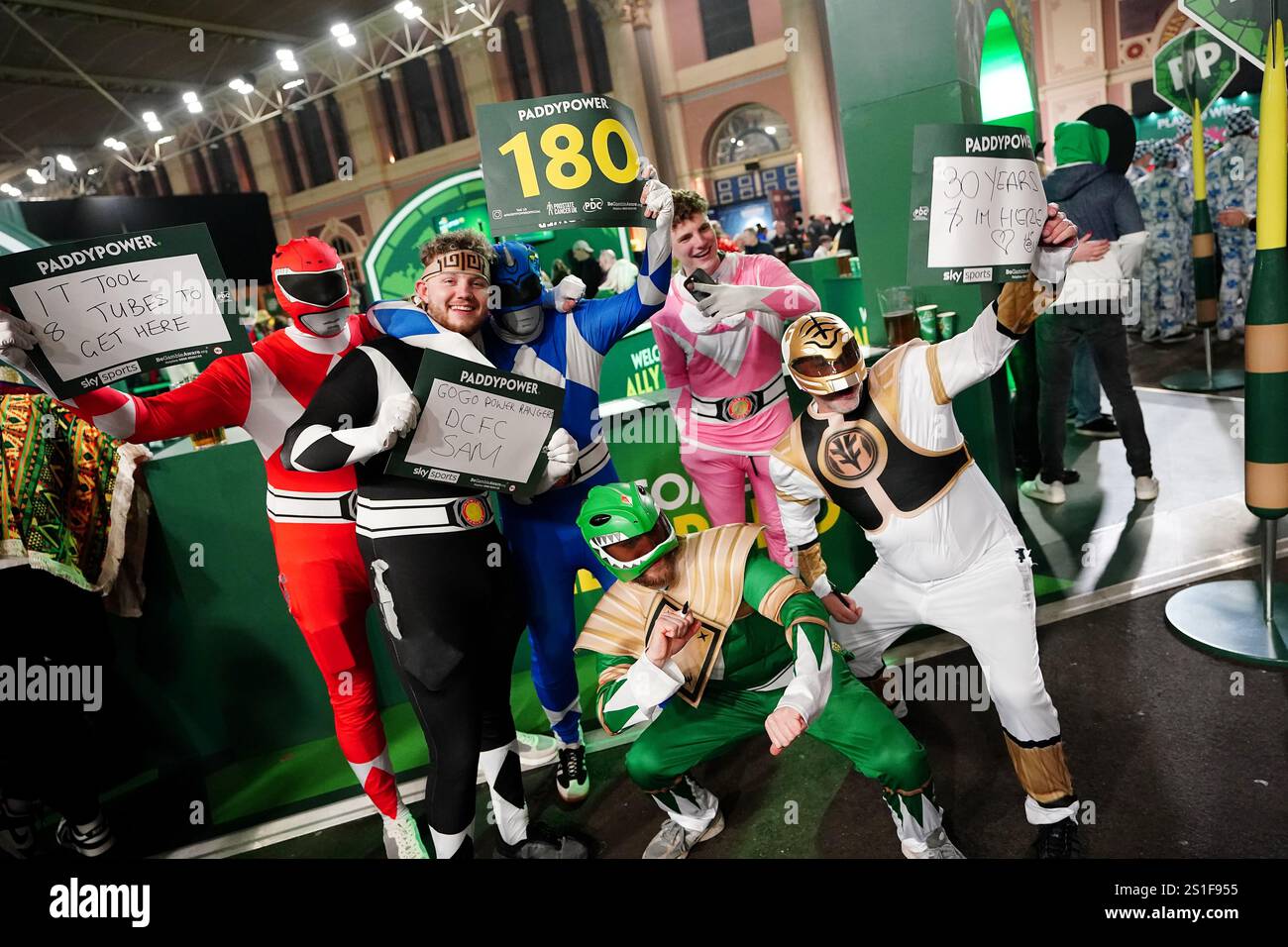 Darts fans in fancy dress ahead of the Paddy Power World Darts