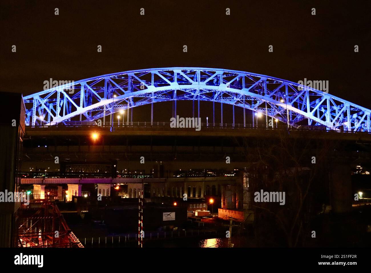 One of Cleveland's 300 bridges in blue light in December 2024 Stock Photo