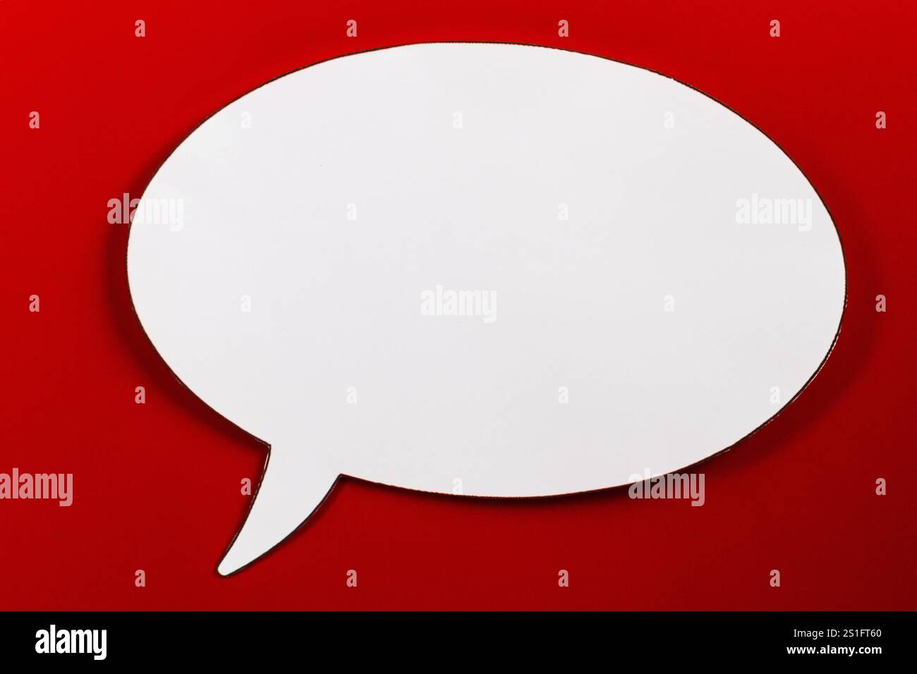 Empty speech bubble on red background Stock Photo
