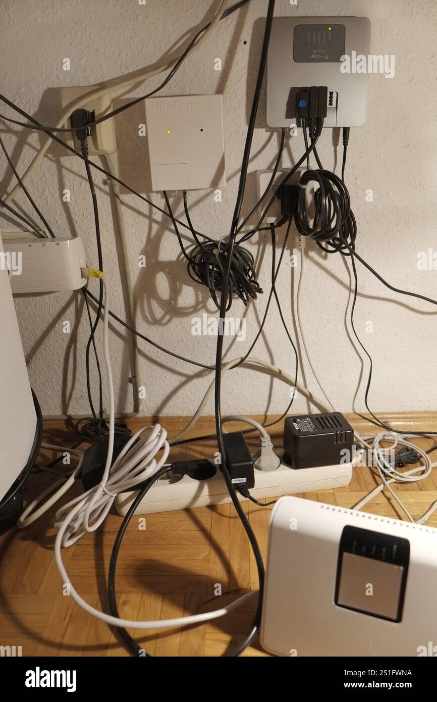 Confusing tangle of cables for internet and telephone connection ...