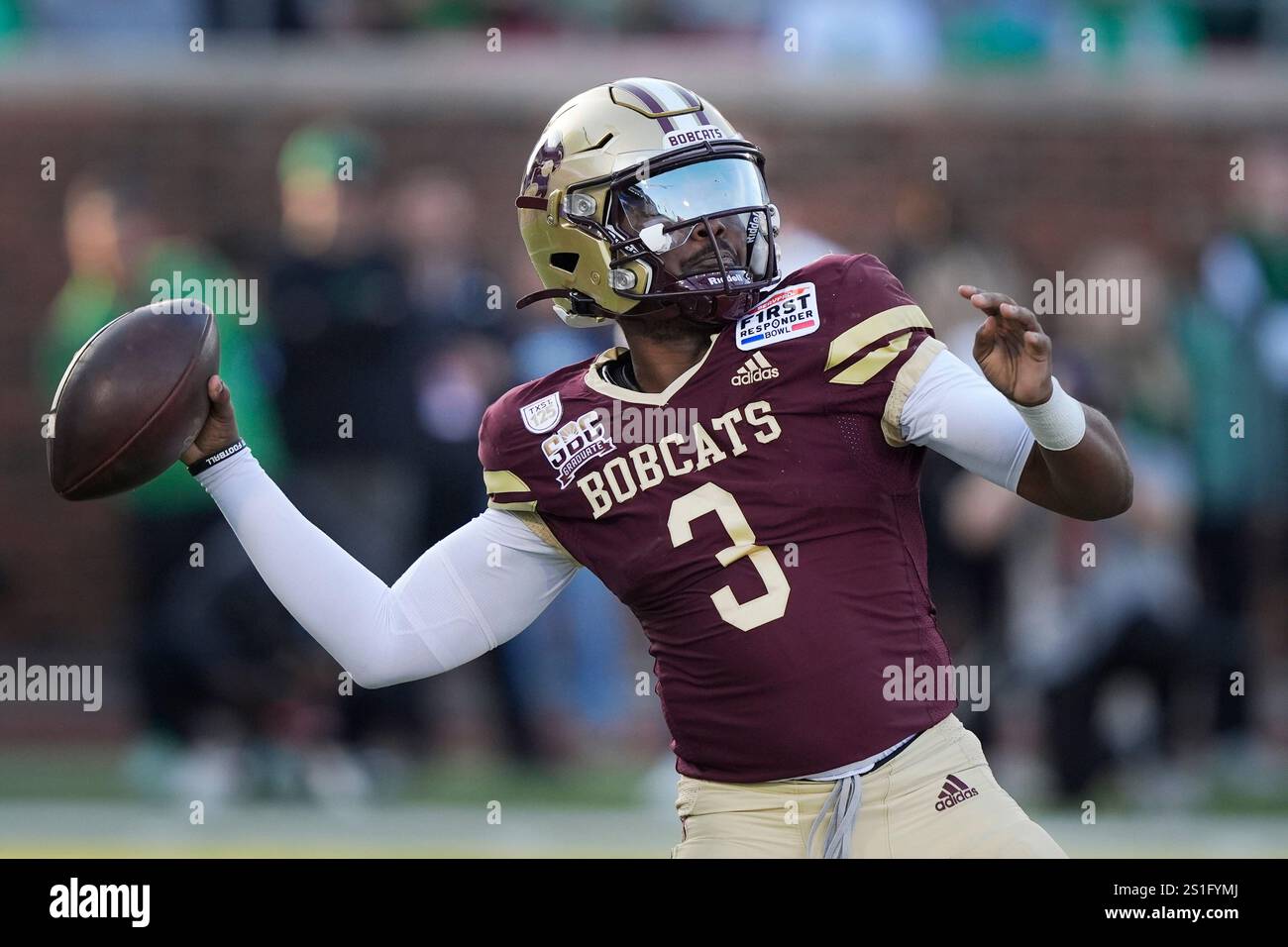 Texas State quarterback Jordan McCloud (3) passes against North Texas