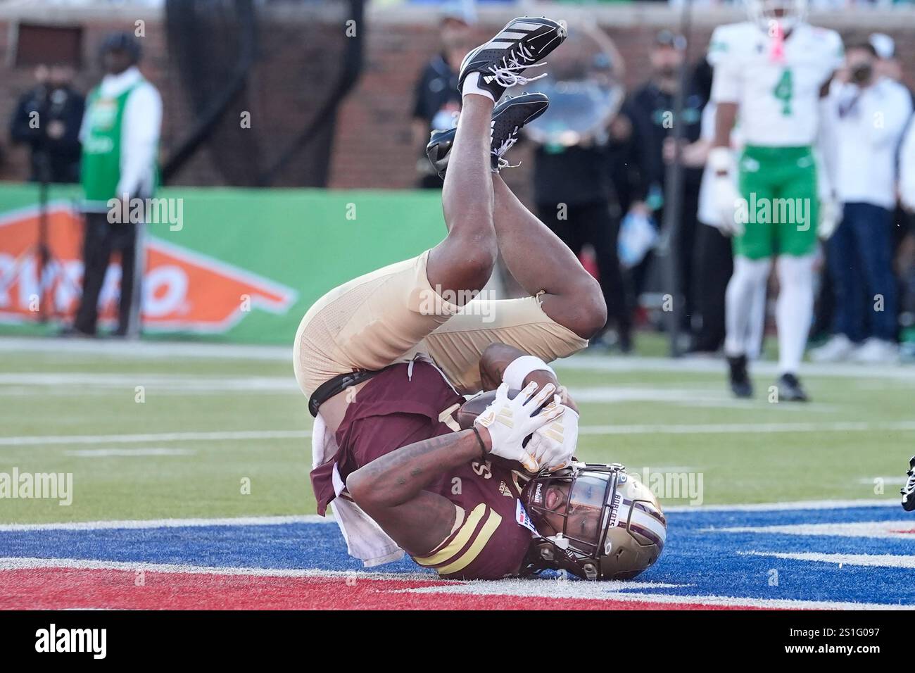 Texas State wide receiver Landon Sides lands after catching a touchdown