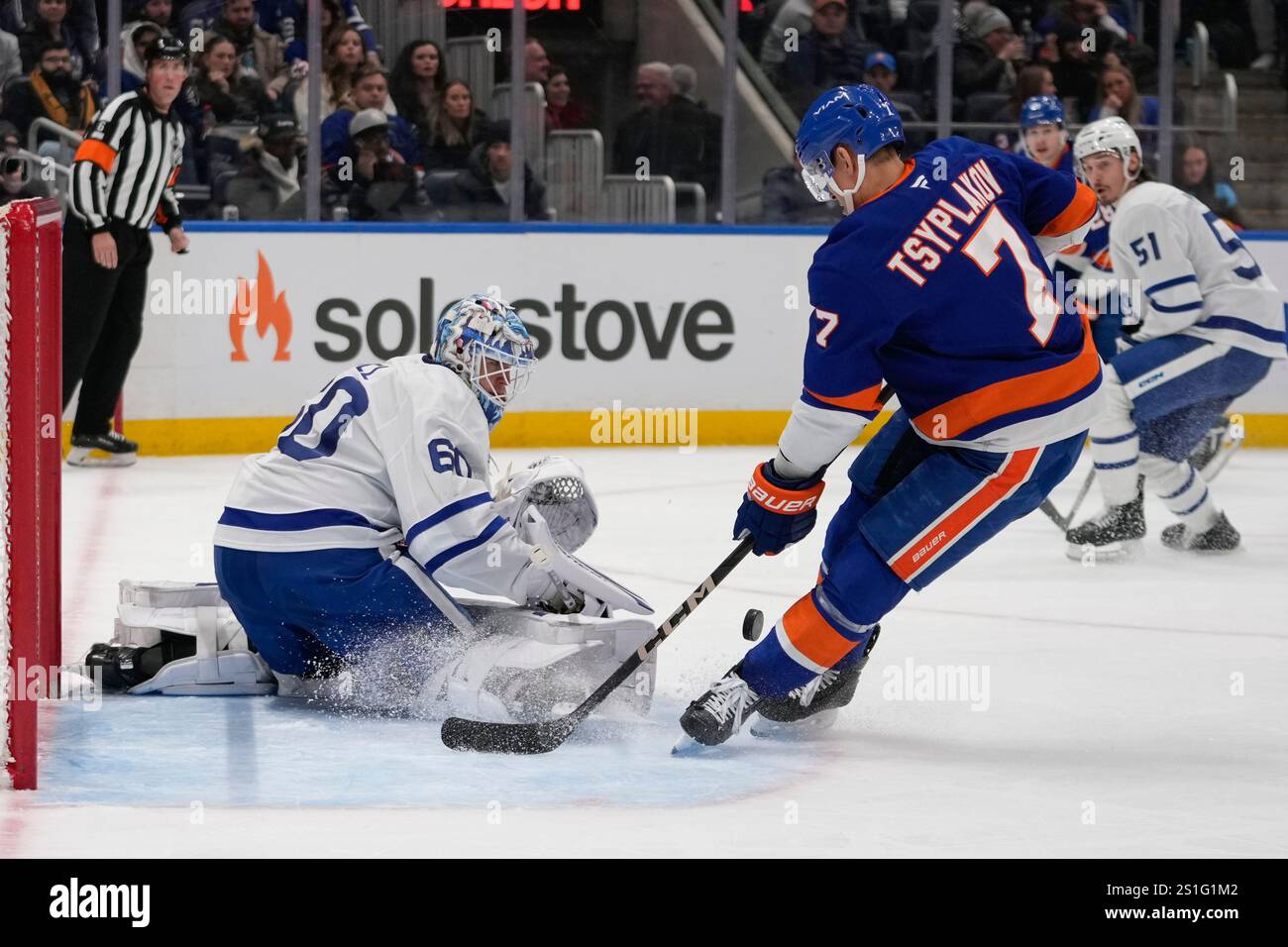 Toronto Maple Leafs goaltender Joseph Woll (60) stops a shot by New