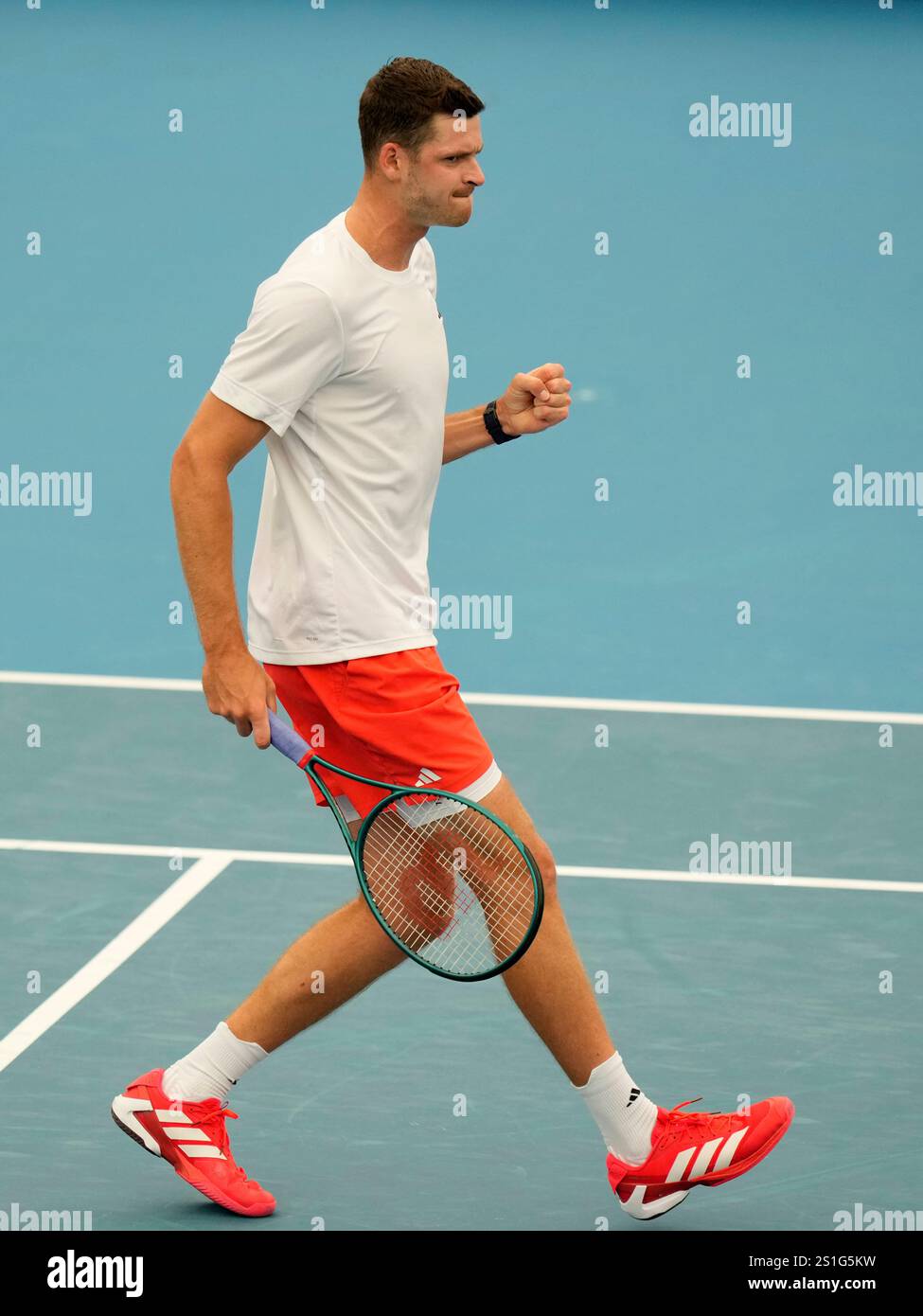 Poland's Hubert Hurkacz celebrates winning a game against Kazakhstan's