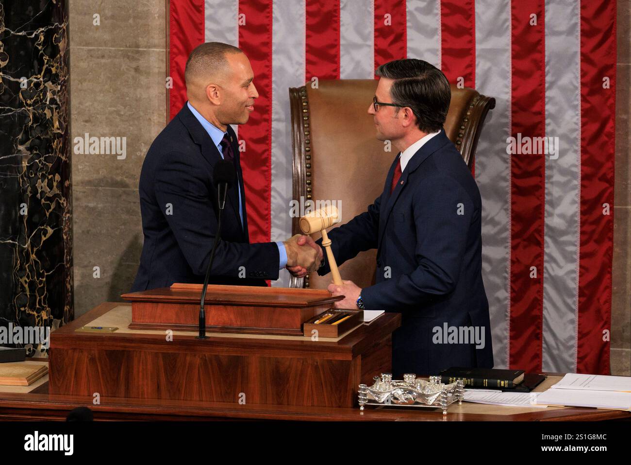 Washington, United States Of America. 03rd Jan, 2025. United States House Minority Leader Hakeem Jeffries (Democrat of New York) hands the Speaker's Gavel to Speaker of the US House of Representatives Mike Johnson (Republican of Louisiana) during the Opening of the 119th Congress in the House Chambers of the Capitol Building in Washington DC on Friday, January 3, 2025. Republicans re-elected Mike Johnson to Speaker of the House after conservative holdouts changed their votes to Johnson.Credit: Aaron Schwartz/CNP/Sipa USA Credit: Sipa USA/Alamy Live News Stock Photo