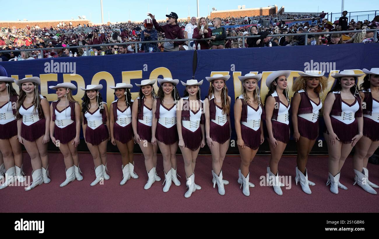 Texas State dancers line up before half time during the First Responder