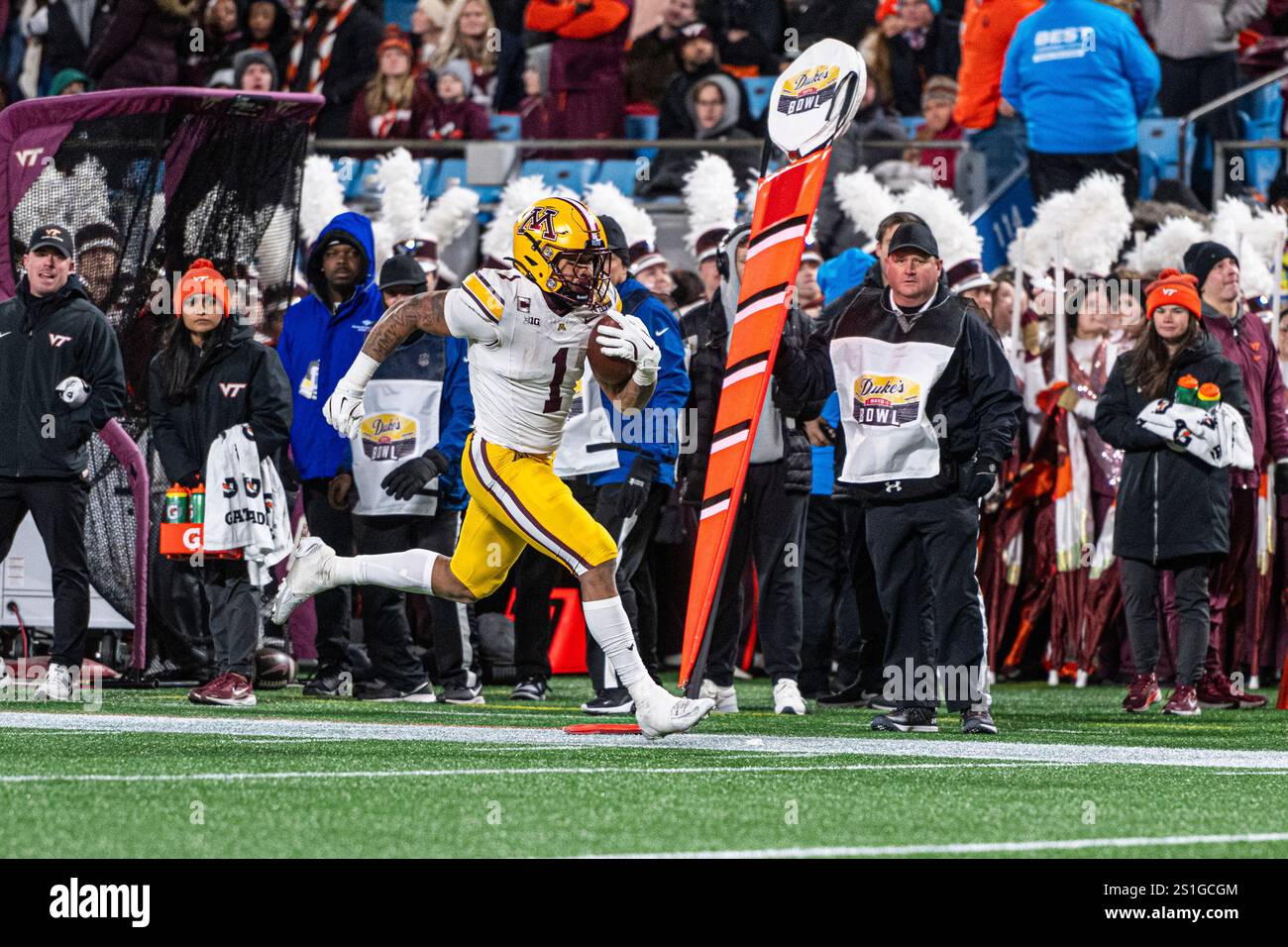 Minnesota running back Darius Taylor (1) runs for a touchdown during