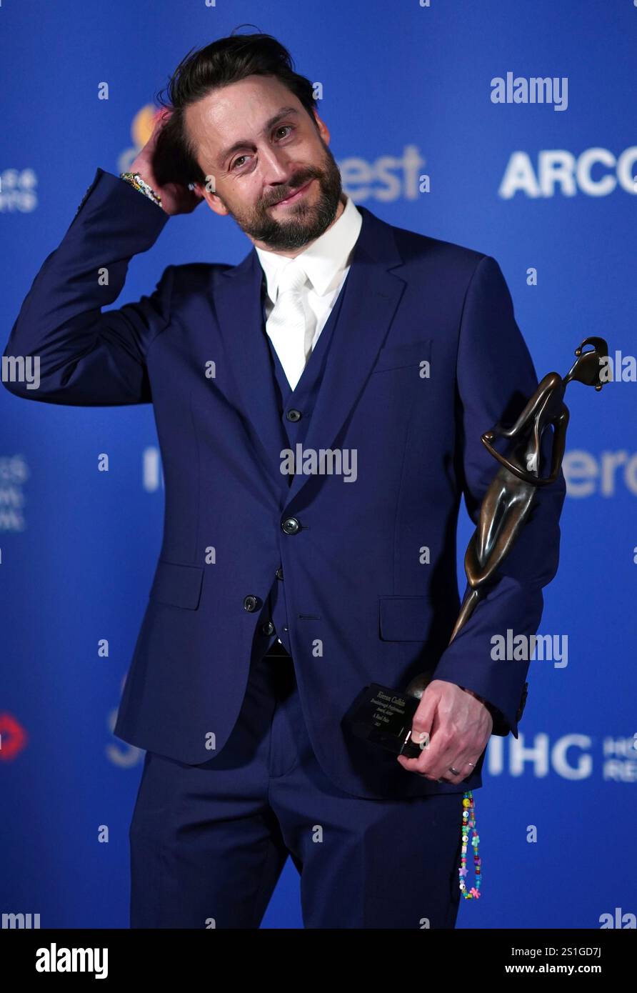 Kieran Culkin poses with the breakthrough performance award, actor for