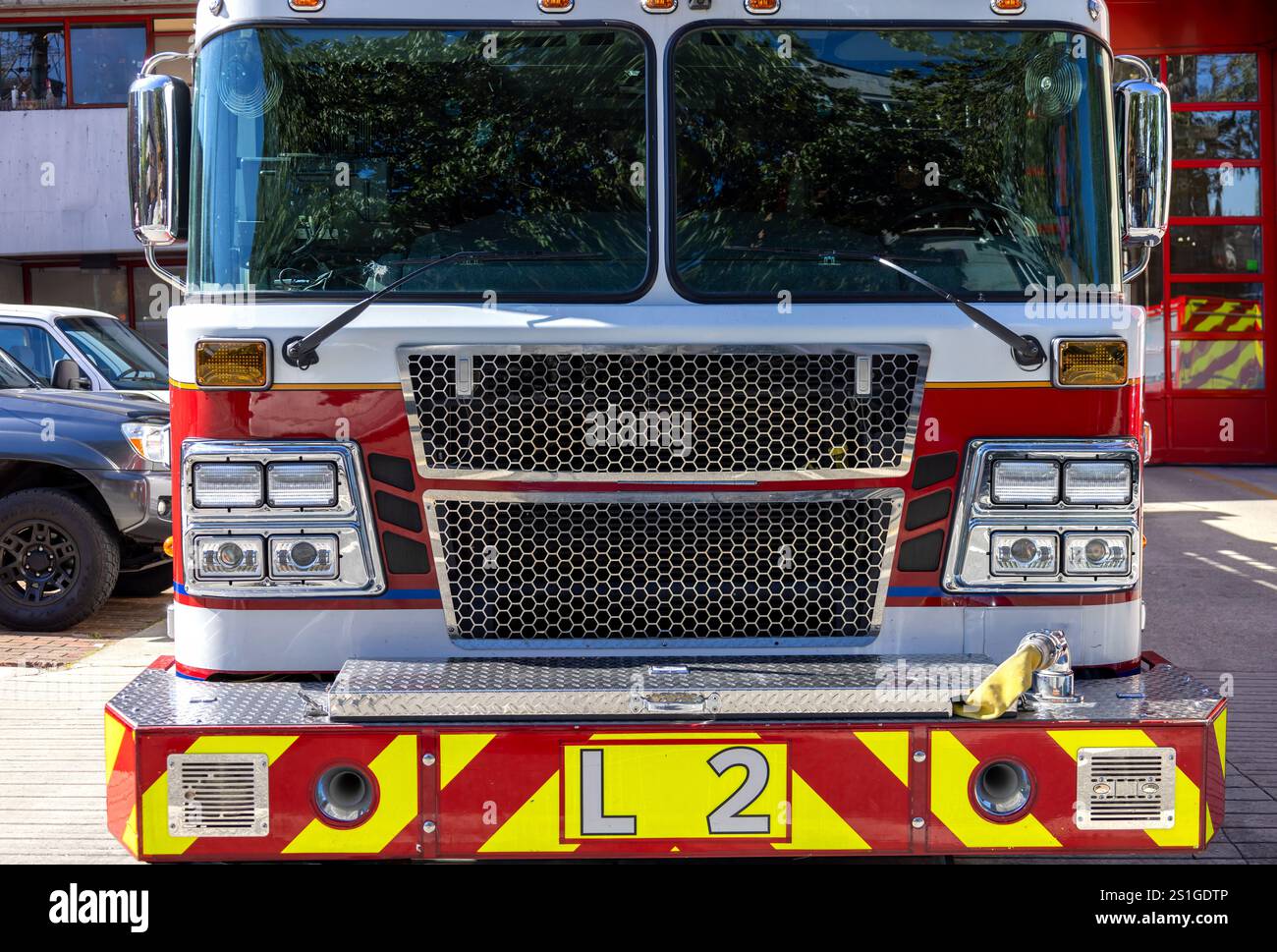 Fire truck ready to respond to emergency Stock Photo - Alamy
