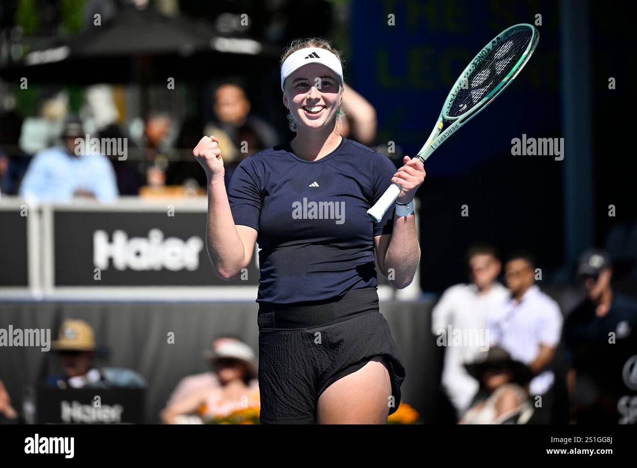 Clara Tauson of Denmark celebrates after winning over Robin Montgomery