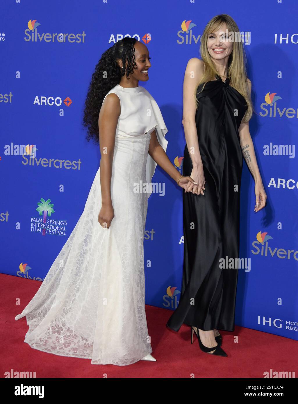 Zahara Marley Jolie and Angelina Jolie arriving at the 36th Annual Palm