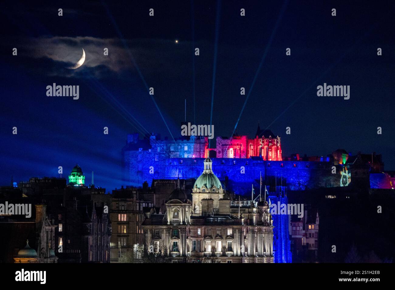 The waxing Moon and Venus above Edinburgh Castle. Picture date Friday