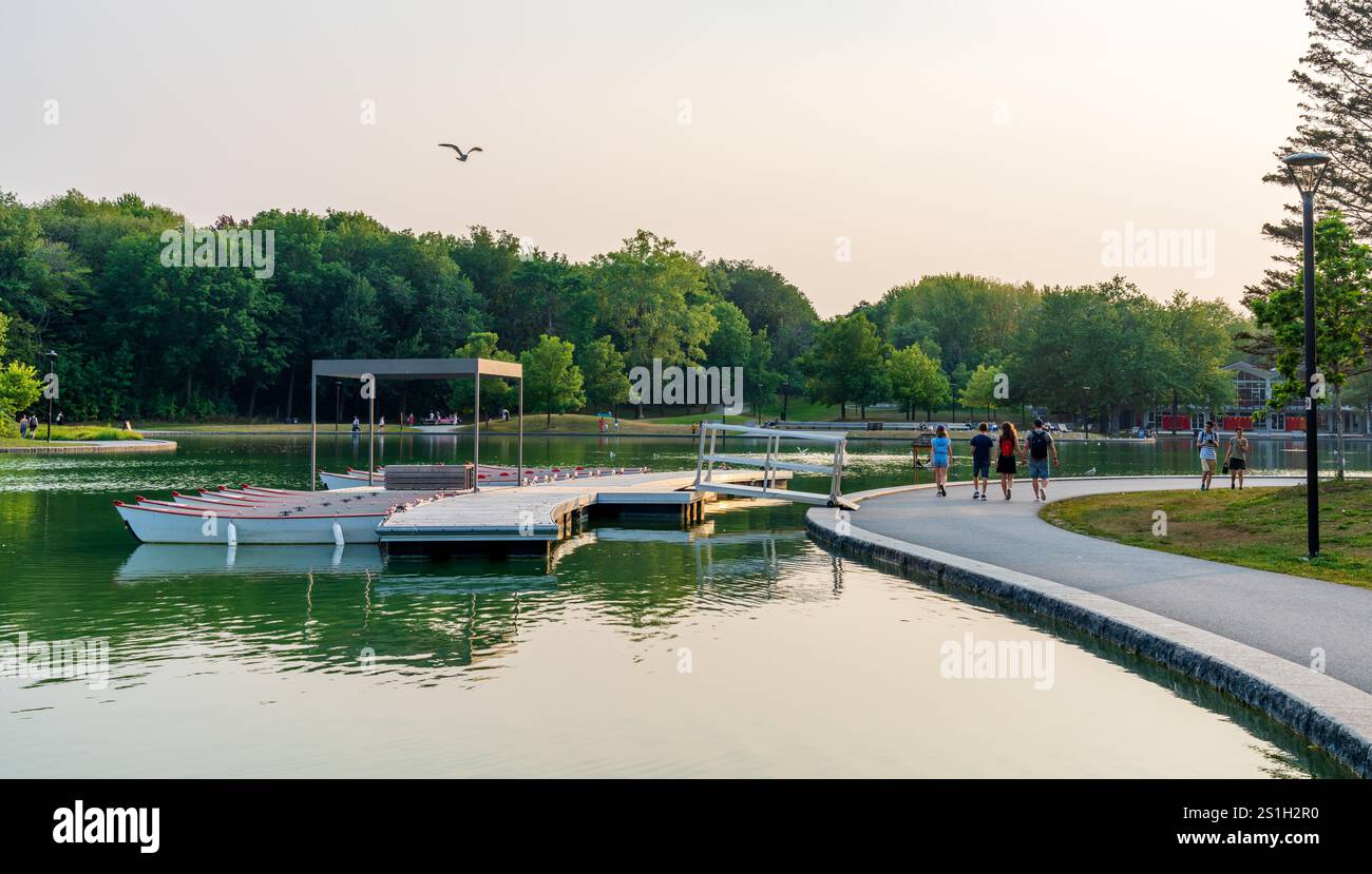 Mount Royal Park ( Parc du Mont-Royal ) Beaver Lake in summer sunset ...