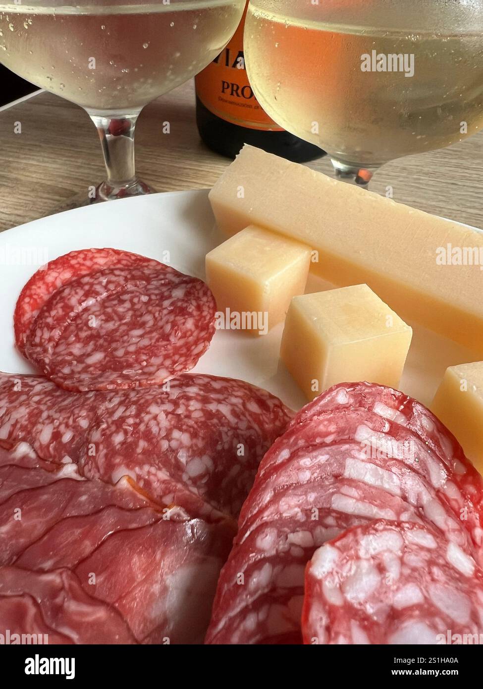 cheese and sausage board with Prosecco - Smartphone Captured Stock Image