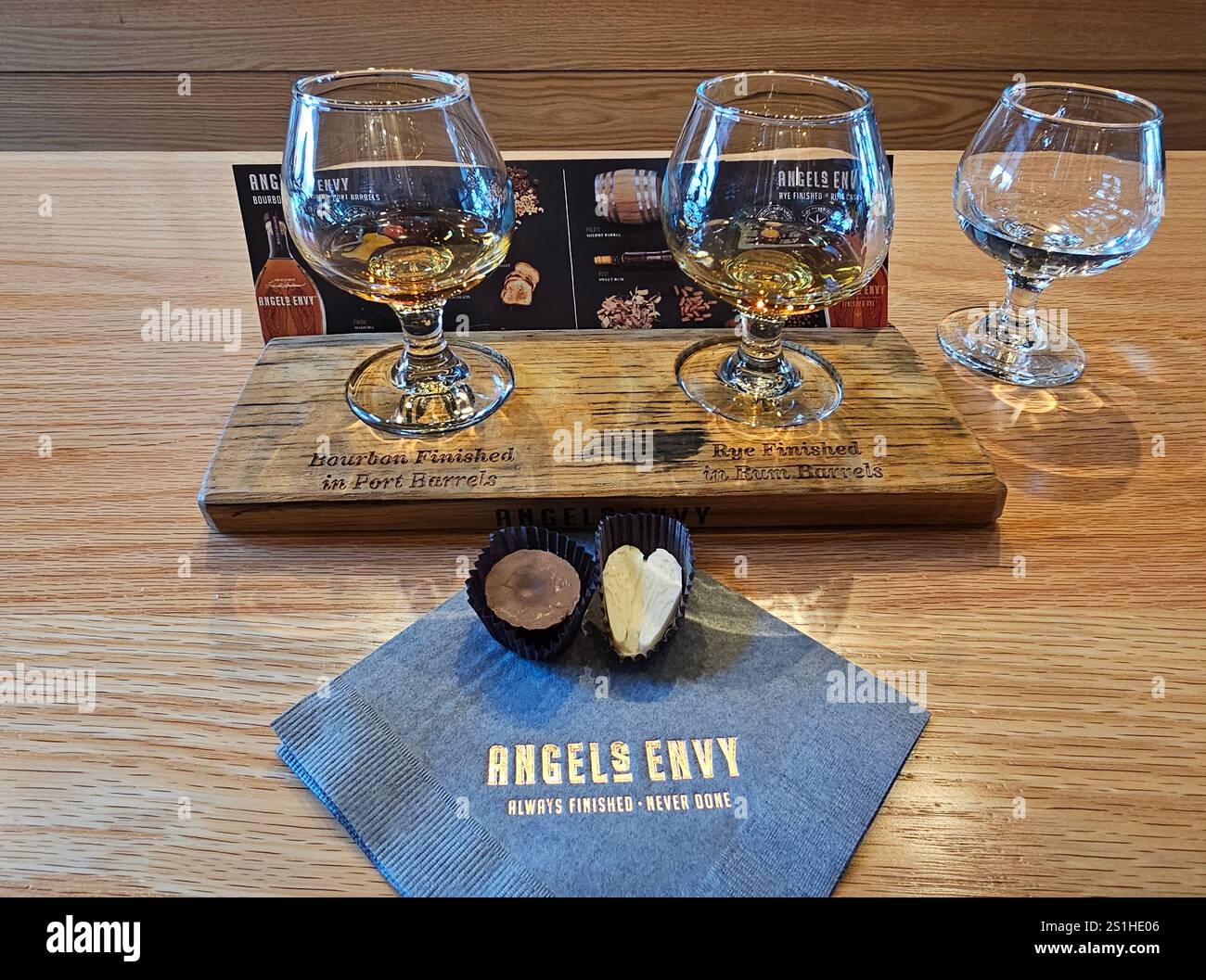 Bourbon and rye whiskey tasting at Angels Envy Distillery, Louisville, Kentucky. The tastings are accompanied by chocolates. - Smartphone Captured Stock Image