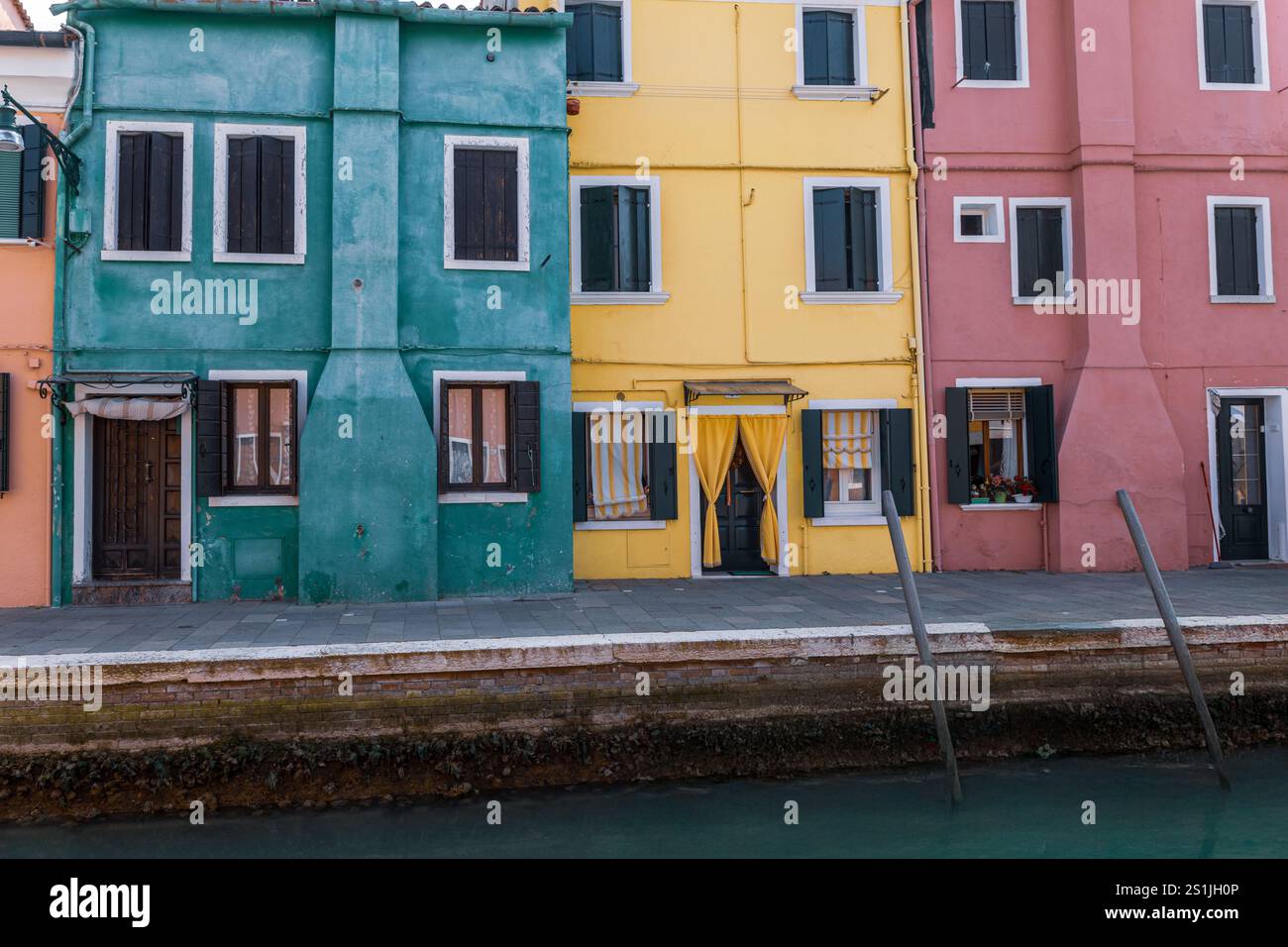 Doors and windows of ancient colorful Venetian houses Stock Photo - Alamy