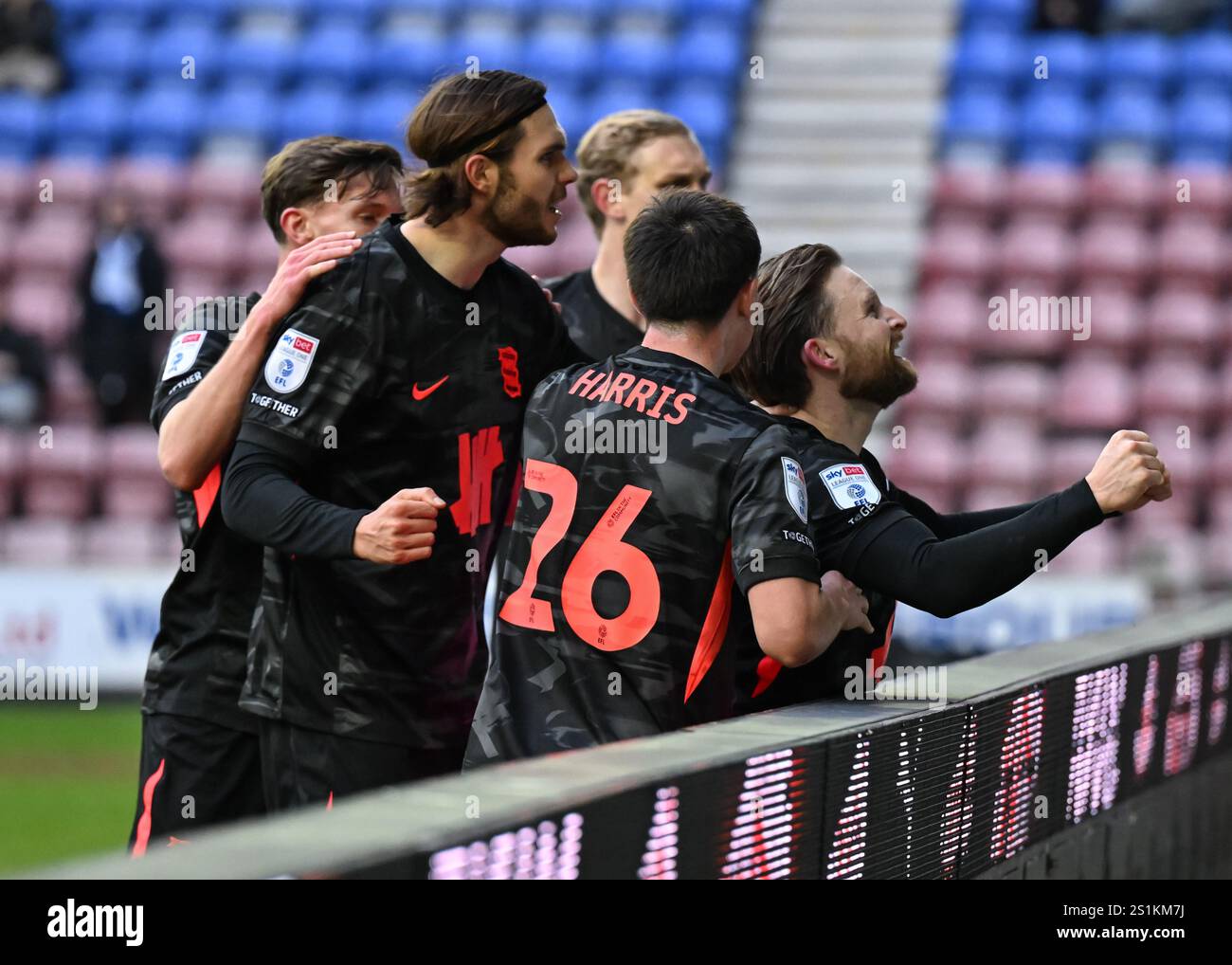 Birmingham City's Alfie May celebrates with teammates after scoring his