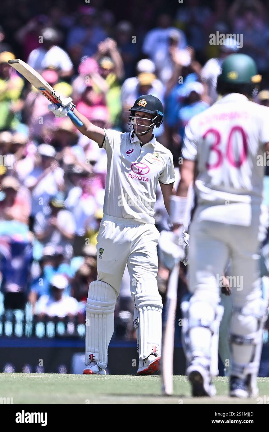 Debutant Beau Webster of Australia raises his bat to celebrate completing his half-century (50 runs) during day two of the Fifth Men's Test Match in the Border-Gavaskar Trophy series between Australia and India at Sydney Cricket Ground (SCG). After stumps on Day 2 of the Fifth Test match between Australia and India at the Sydney Cricket Ground: India - 185/10 in 72.2 overs (1st innings), Australia 181/10 in (50.6) overs (1st innings); India - 141/6 in 32 overs (2nd innings), Australia - YTB (2nd innings). India leads by 145 runs. Stock Photo