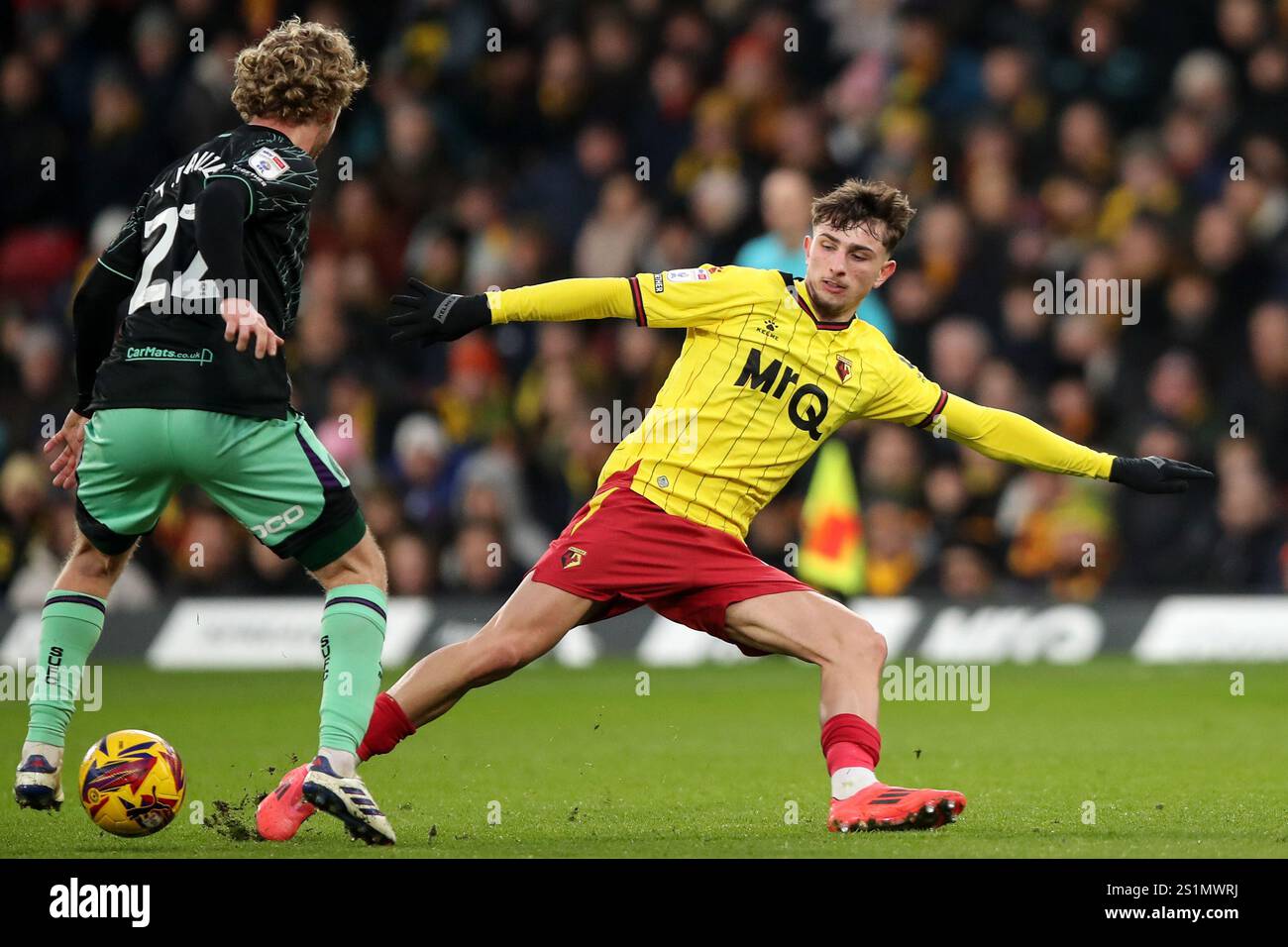 Watford's Rocco Vata battles for the ball against Sheffield United's Tom Davies during the Sky Bet Championship match at Vicarage Road, Watford. Picture date: Saturday January 4, 2025. Stock Photo