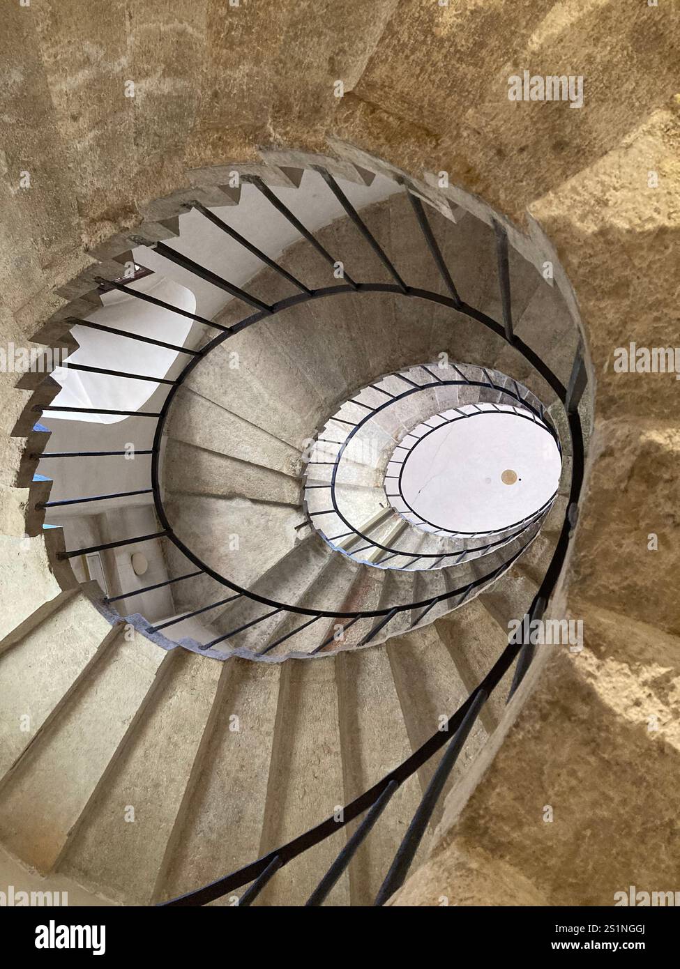 Spiral staircase made from stone. - Smartphone Captured Stock Image