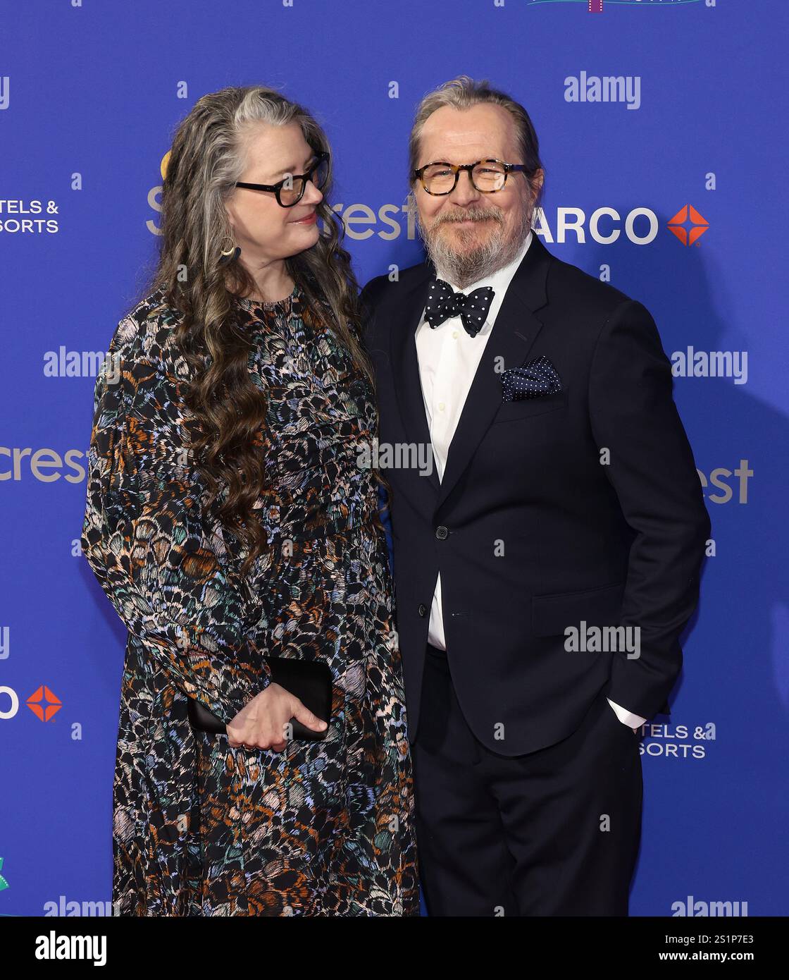 Gisele Schmidt, Gary Oldman attend the 36th Annual Palm Springs