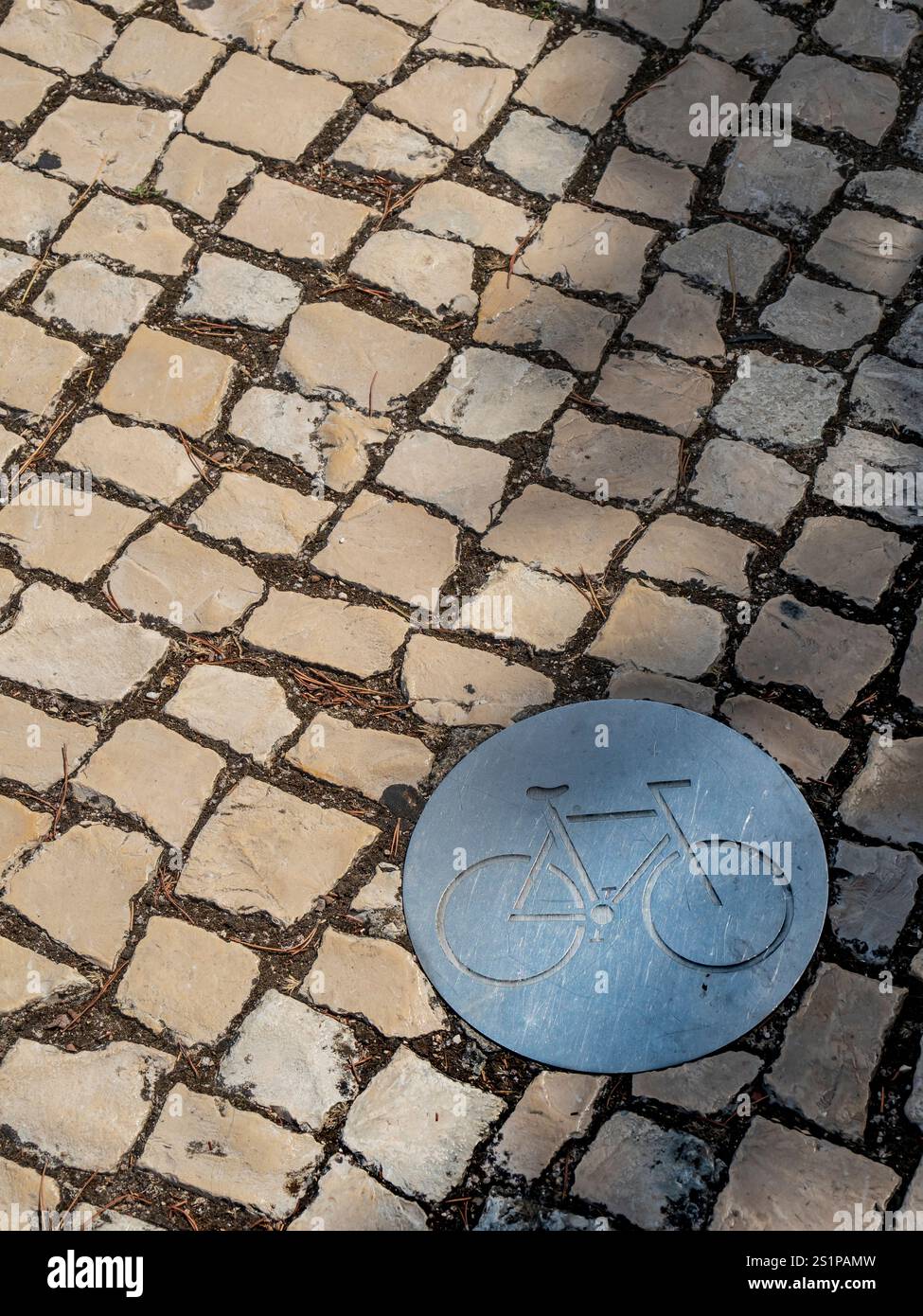 Bicycle plaque in sidewalk, Parque das Nações neighborhood, Lisbon, Portugal. Stock Photo