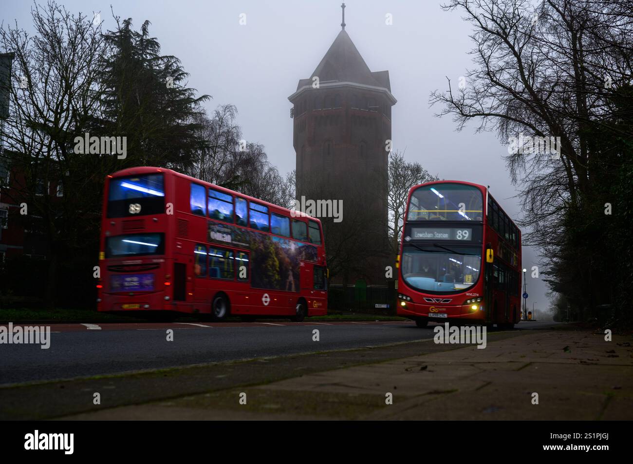 London bus number 89 from Slade Green to Lewisham passing by the water tower at Shooter's Hill in Greenwich Stock Photo