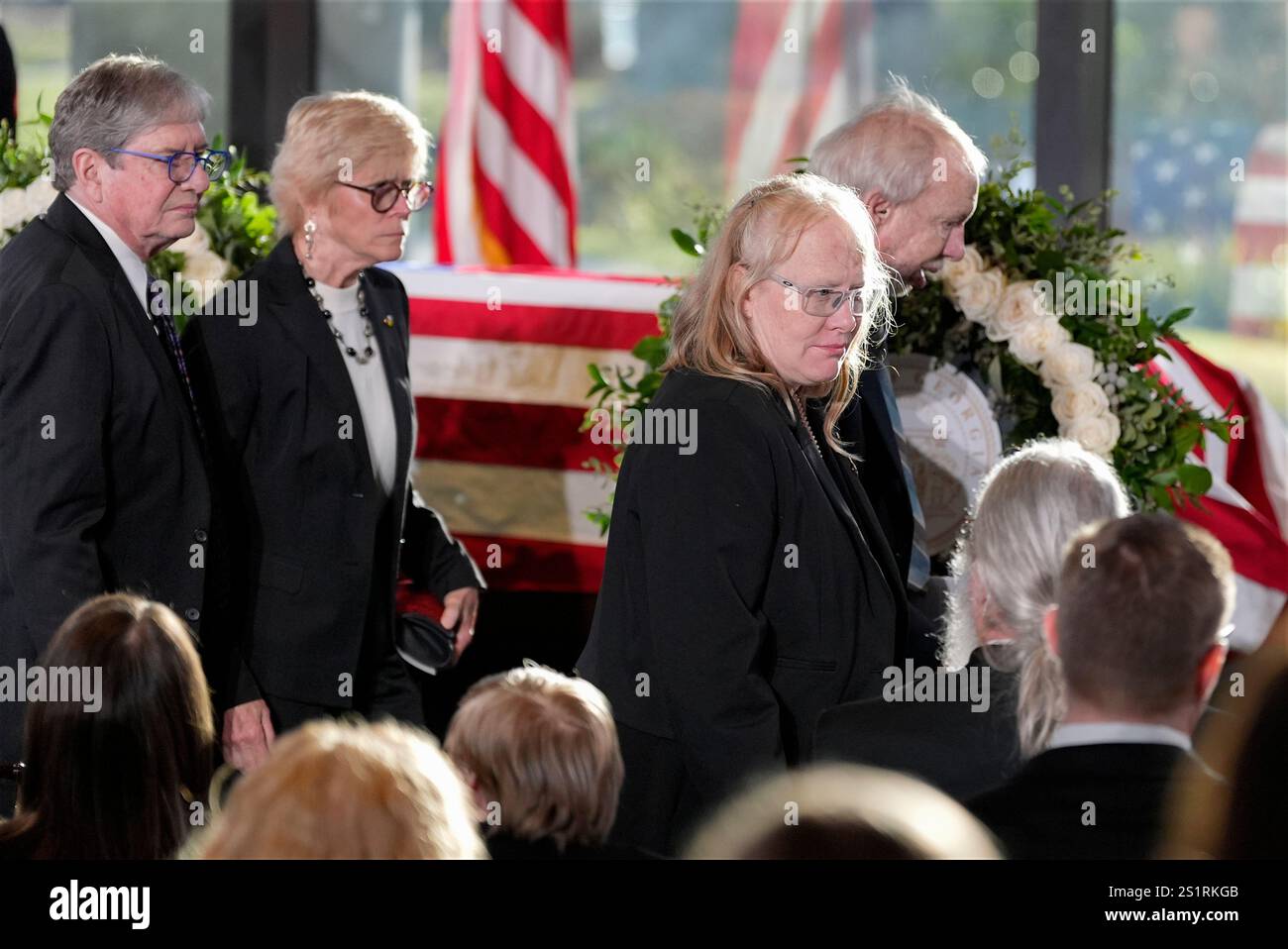 James "Chip" Carter and his wife Becky, left, Amy Carter and Jeff