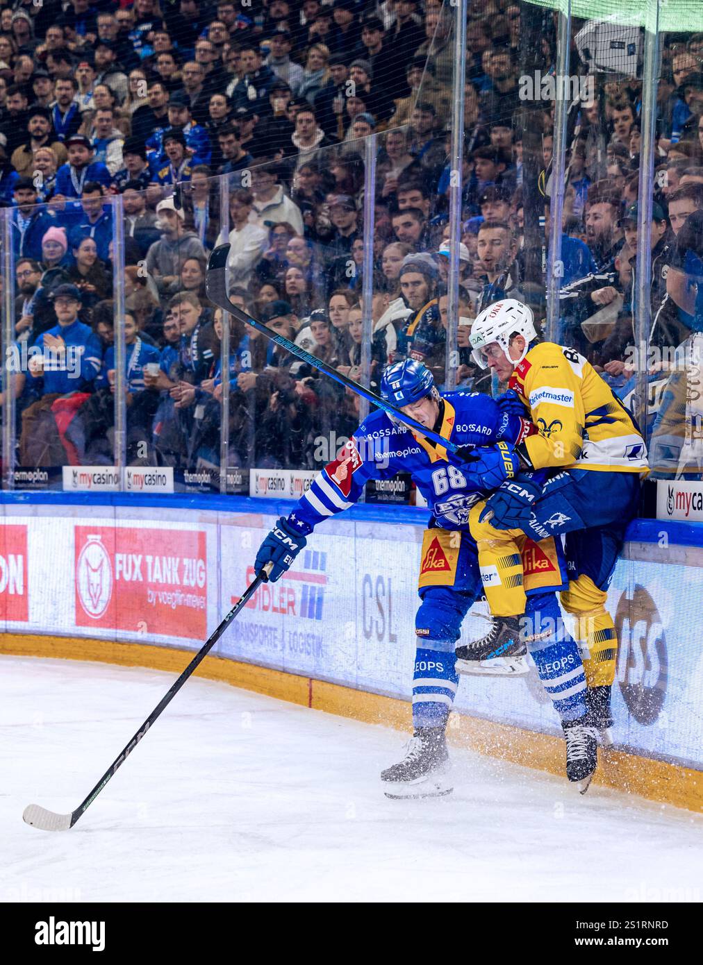 Check by Fabrice Herzog 68 (EV Zug) against Julius Honka 60 (HC Davos