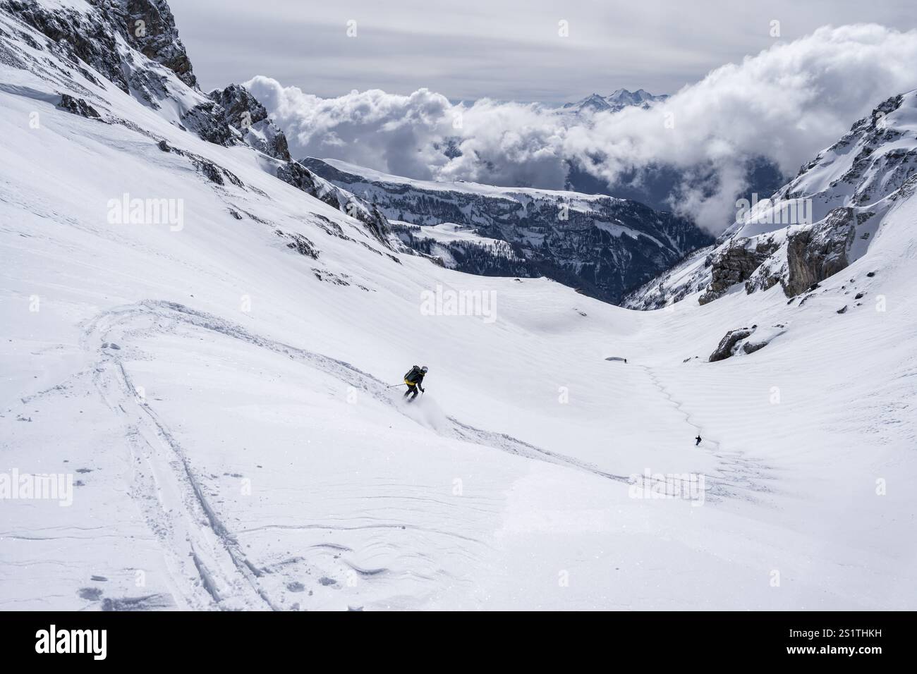 Ski tourer on the descent, Bernese Alps, Bernese Oberland, Switzerland, Europe Stock Photo