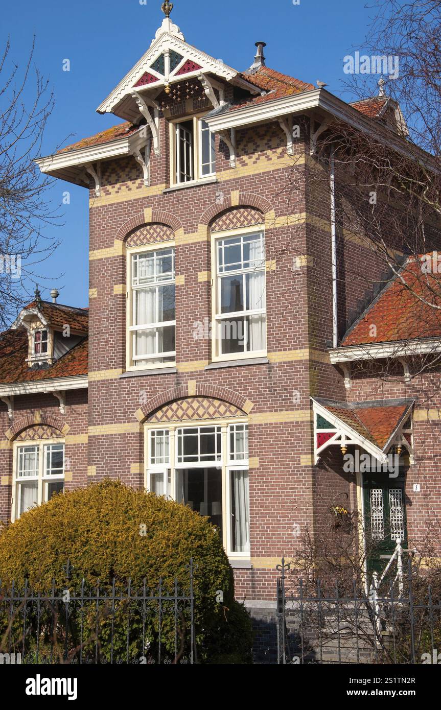 Dutch Brickwork Charming dutch residence showcasing detailed brickwork, ornate windows ...