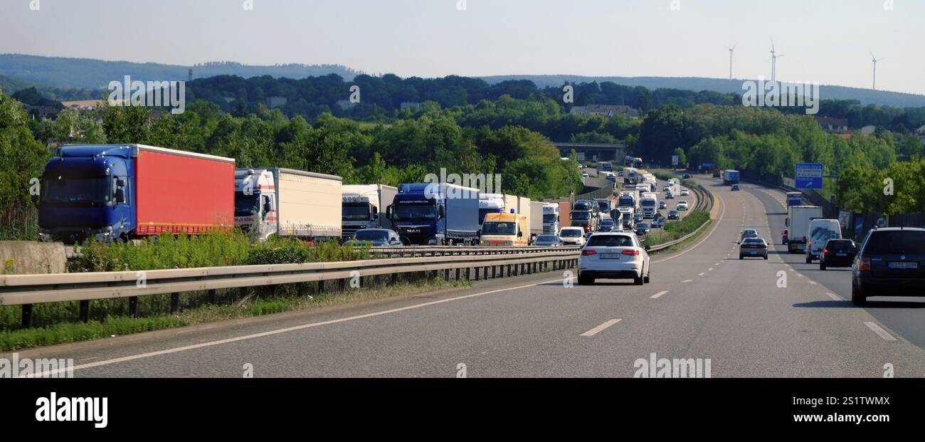 Motorway section with heavy truck traffic in the opposite direction ...