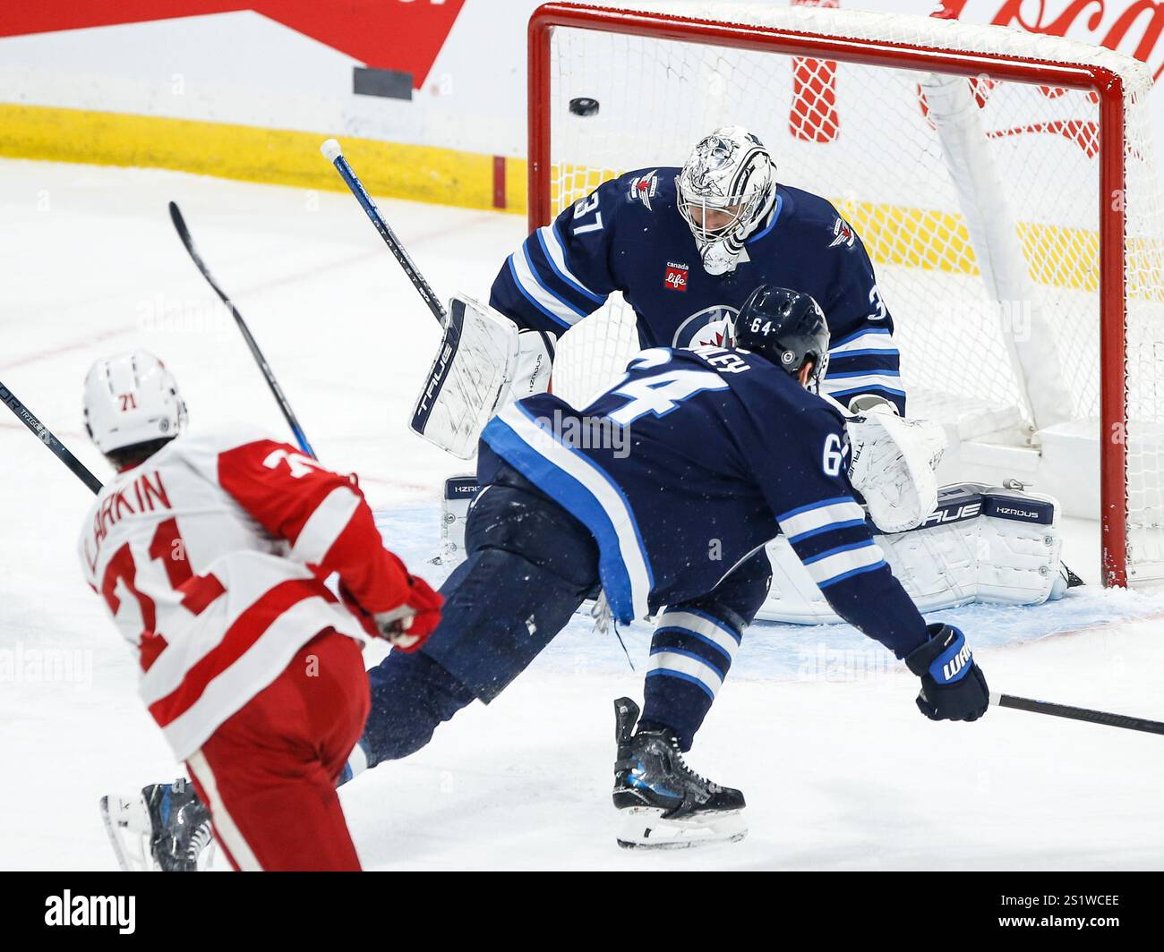 Detroit Red Wings' Dylan Larkin (71) scores against Winnipeg Jets