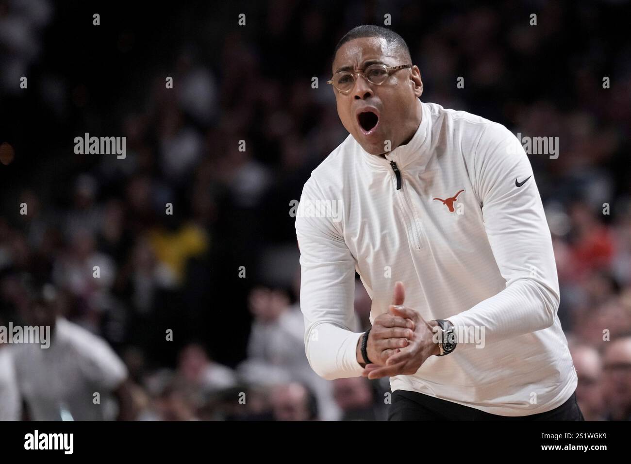 Texas head coach Rodney Terry yells to his defense against Texas A&M ...
