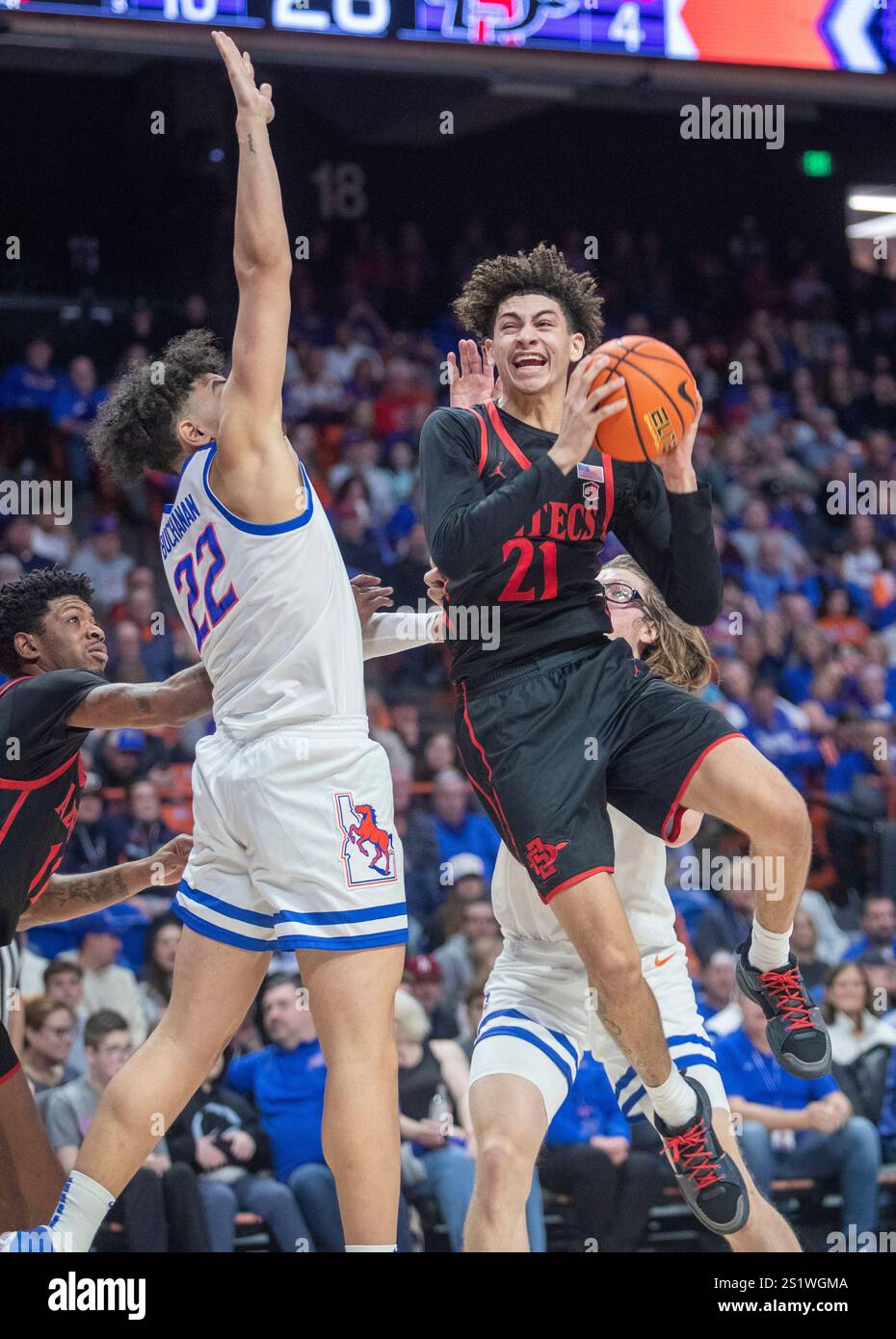 San Diego State's Miles Byrd (21) drives to the basket against Boise