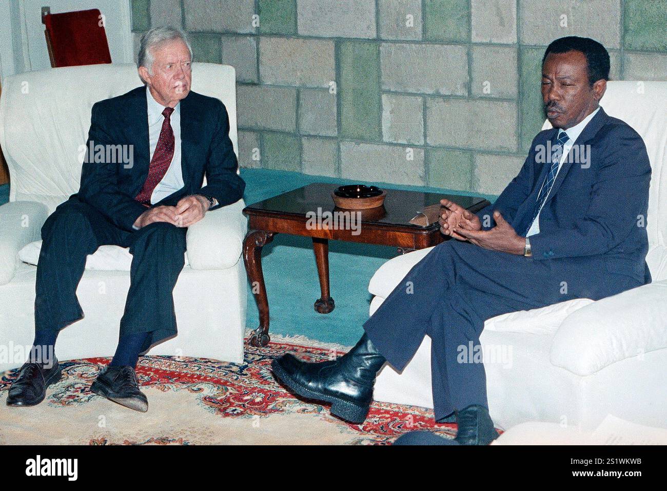 FILE - Former U.S. President Jimmy Carter, left, speaks with Ethiopian ...