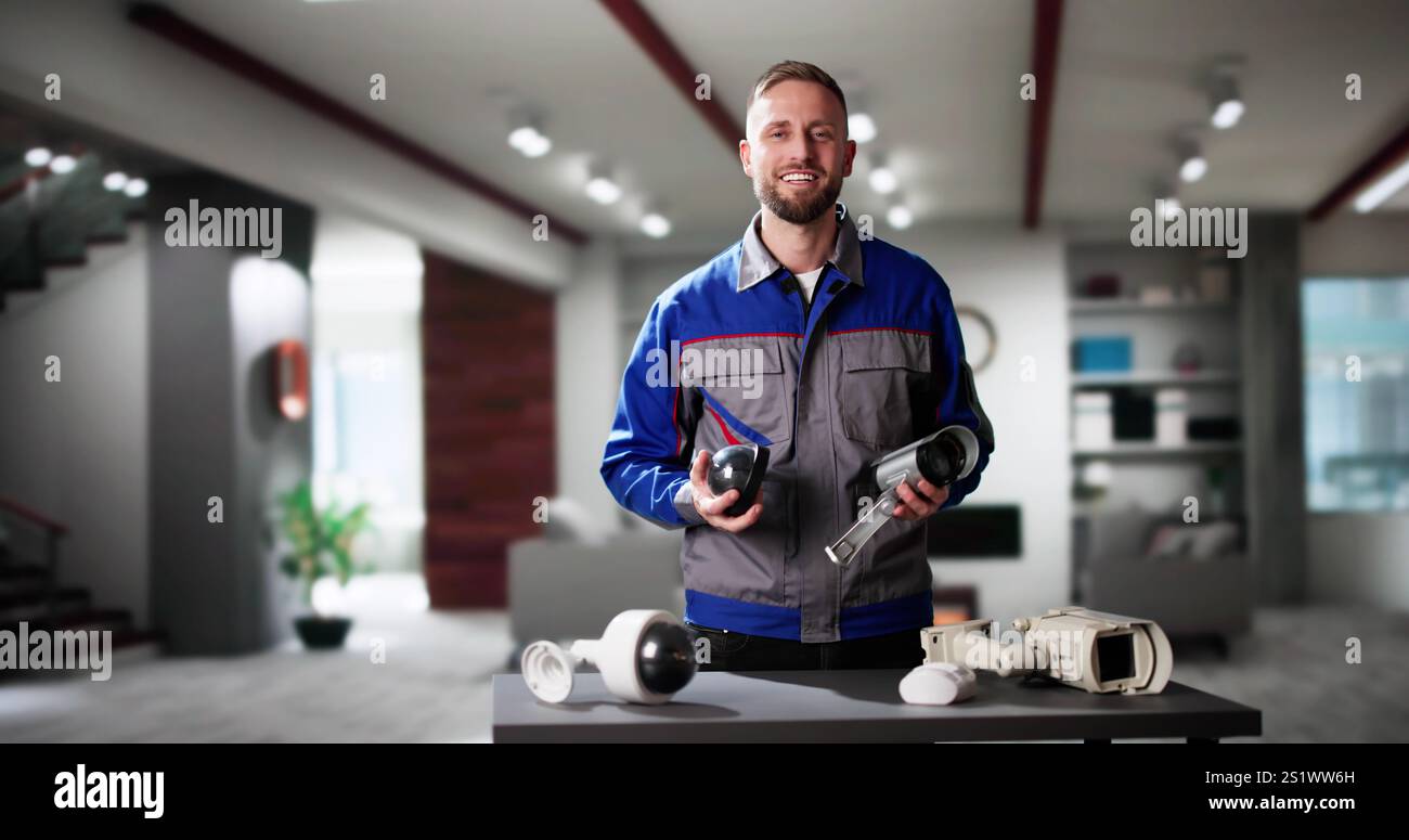 Technician Using Surveillance Security Camera Video System Stock Photo