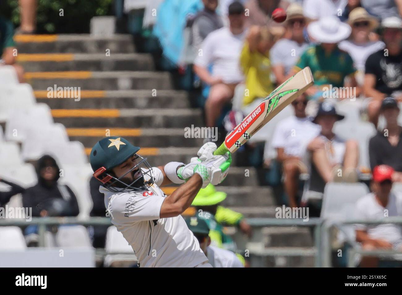 Pakistan's Mohammad Rizwan smashes the ball for six runs during the ...