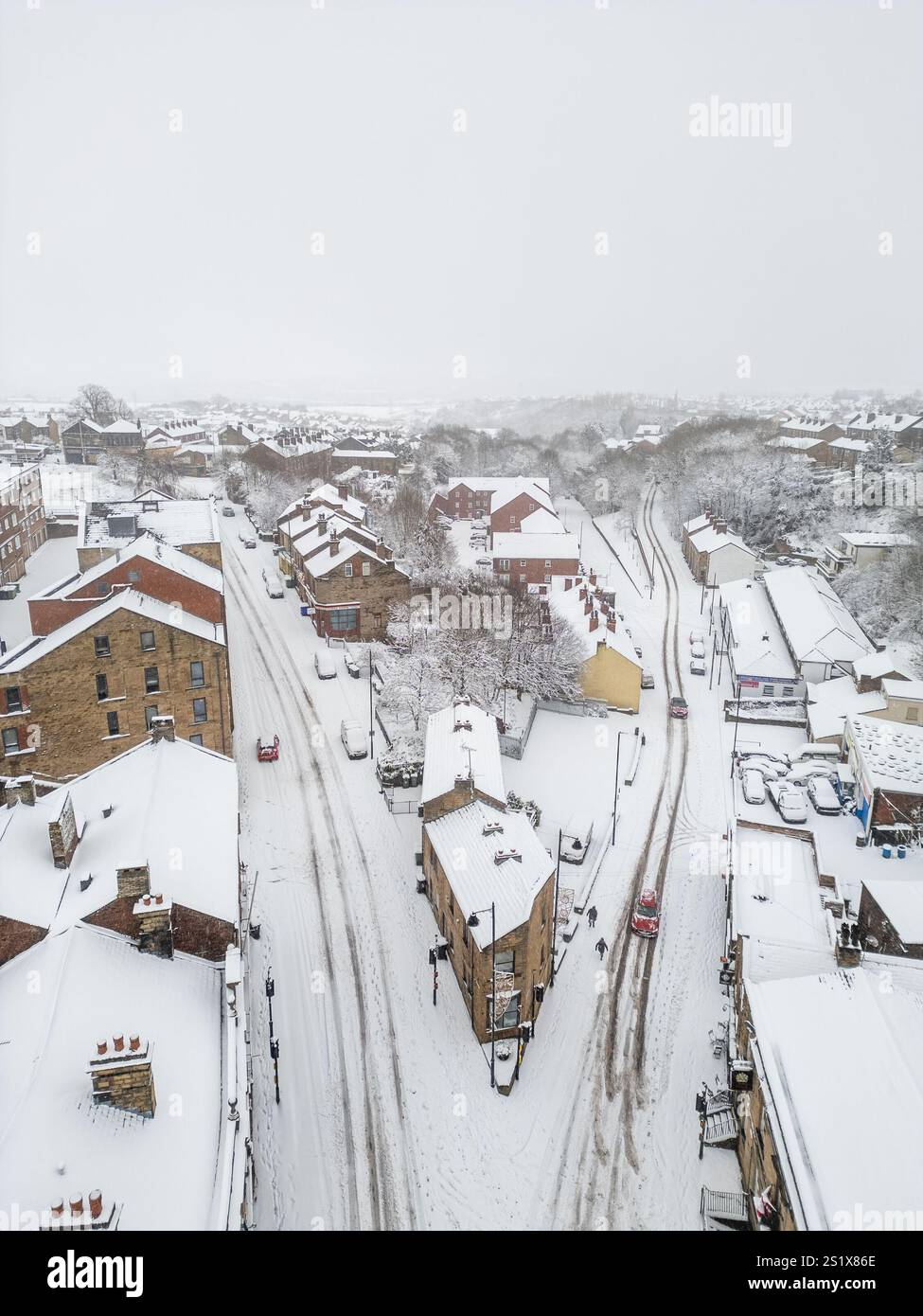Leeds, UK. 5th January 2025. UK Weather Aerial view of heavy snowfall