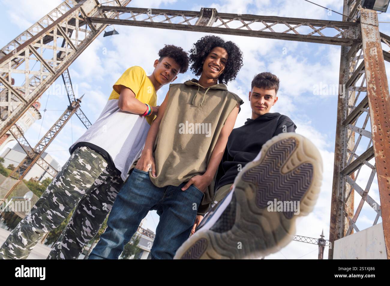 three teenagers looking at camera challenging Stock Photo