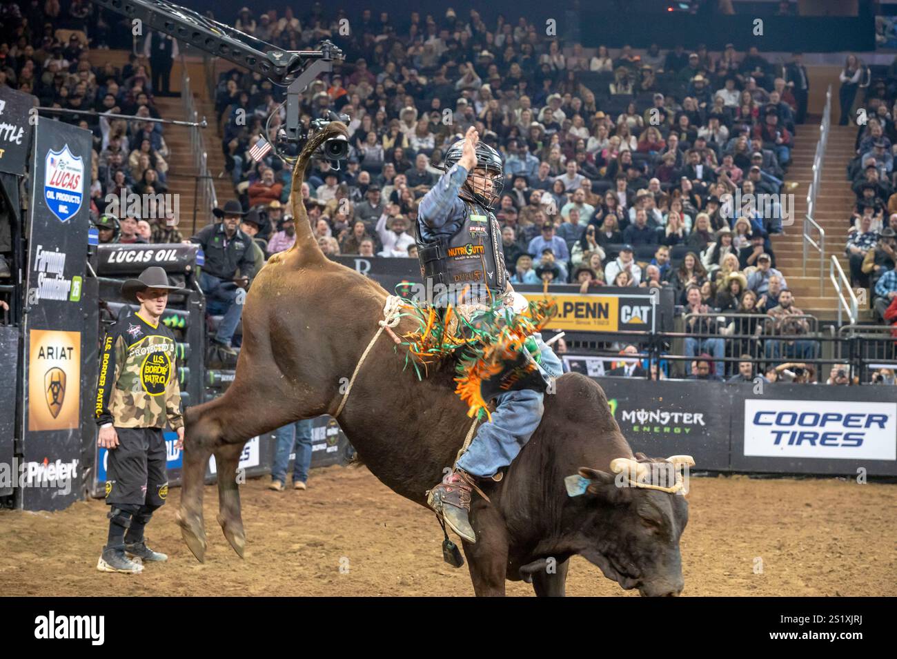 Rogério Venâncio rides Outlaw during the second round of the Professional Bull Riders 2025 Unleash The Beast event at Madison Square Garden. (Photo by Ron Adar / SOPA Images/Sipa USA) Stock Photo