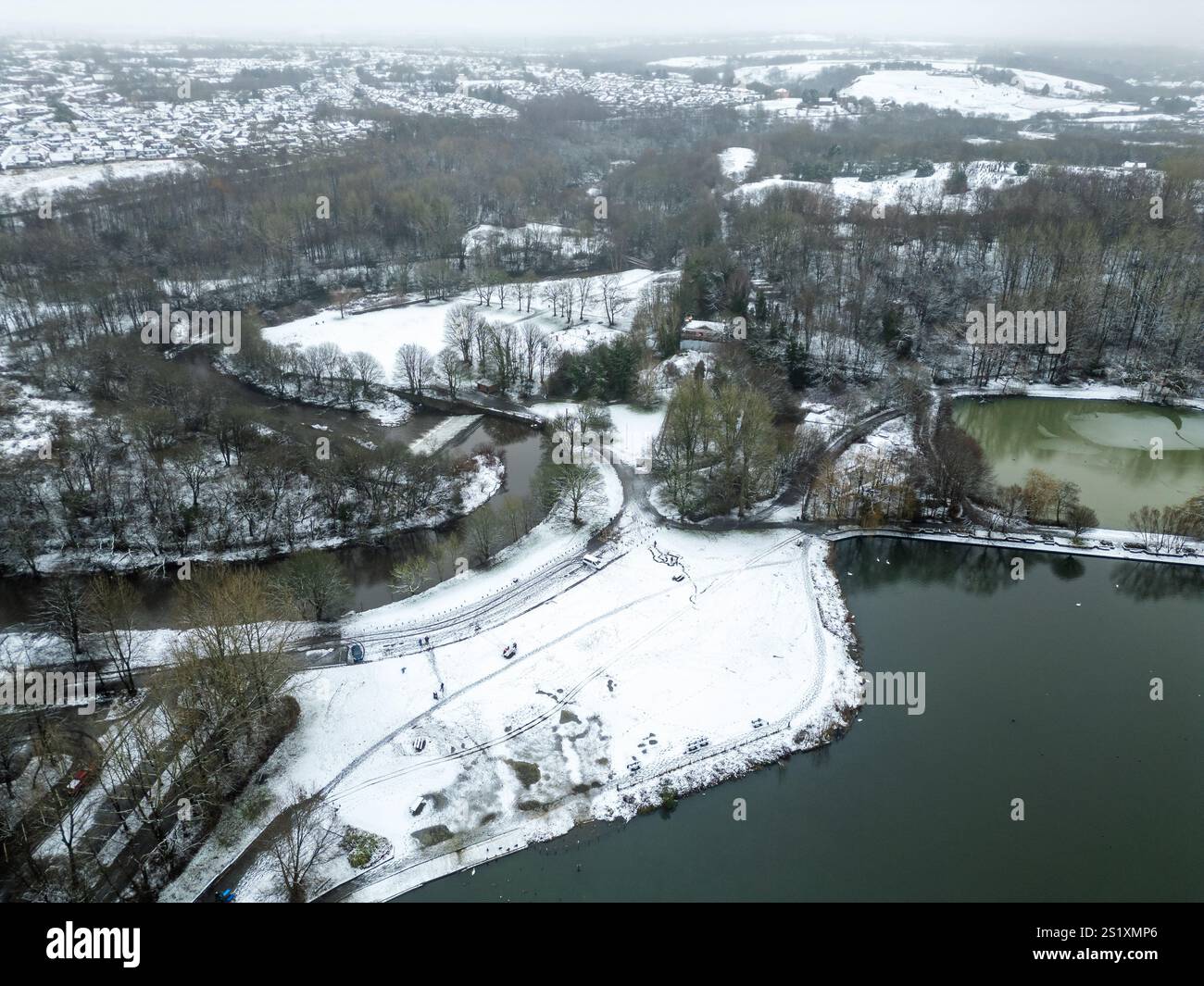 Bolton, UK. 19th January 2025. Residents in Bolton, Lanacshire, awoke to several inches snow covering the town this morning. Fun seekers took advantage of the icy conditions to get the sledges out as well as going for a winter walk through Moses Gate Country Park. Credit: Paul Heyes/Alamy Live News Stock Photo