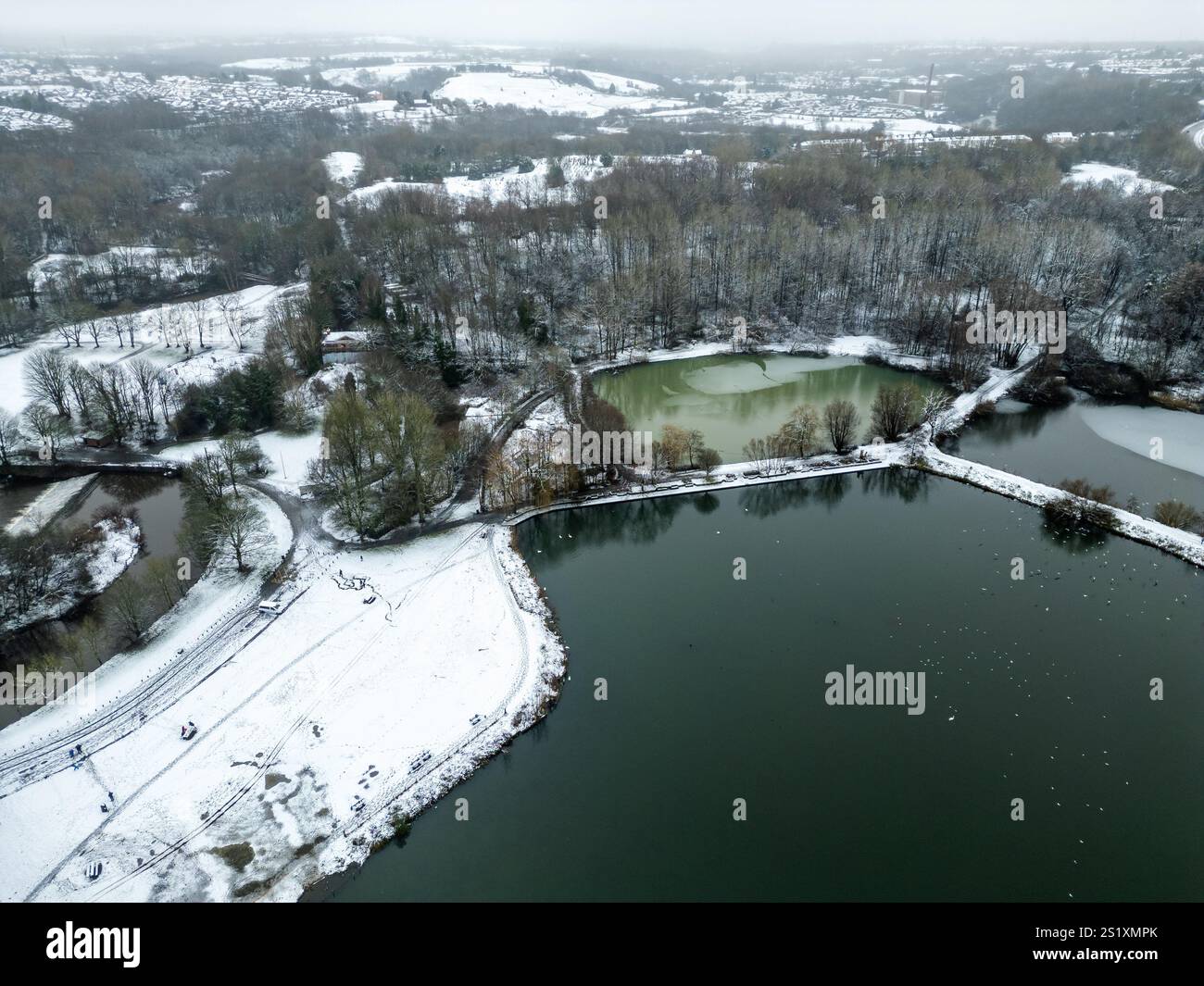 Bolton, UK. 19th January 2025. Residents in Bolton, Lanacshire, awoke to several inches snow covering the town this morning. Fun seekers took advantage of the icy conditions to get the sledges out as well as going for a winter walk through Moses Gate Country Park. Credit: Paul Heyes/Alamy Live News Stock Photo