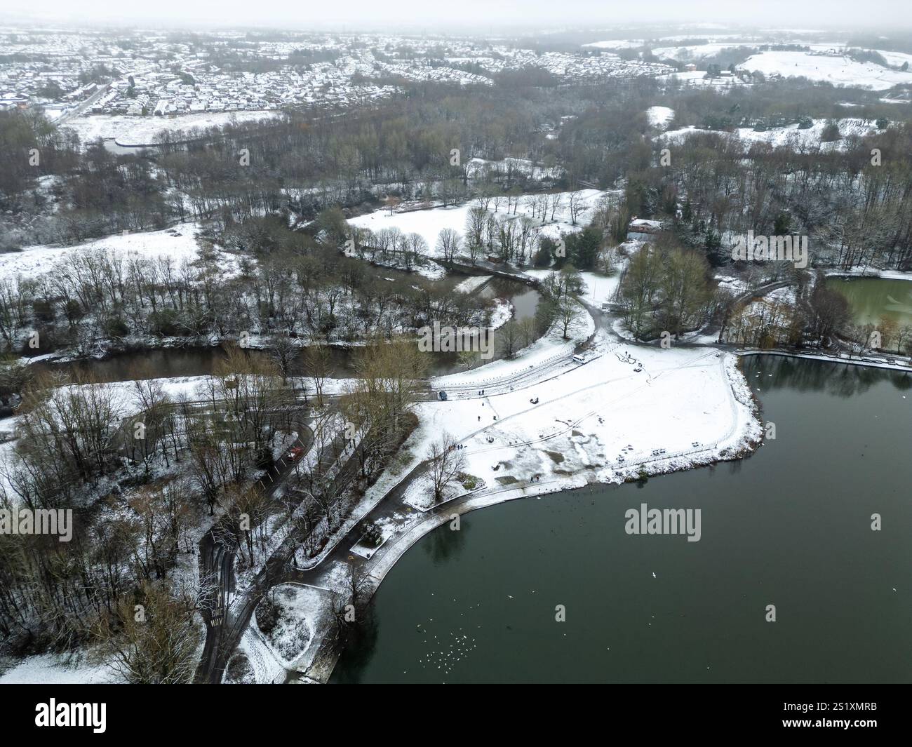 Bolton, UK. 19th January 2025. Residents in Bolton, Lanacshire, awoke to several inches snow covering the town this morning. Fun seekers took advantage of the icy conditions to get the sledges out as well as going for a winter walk through Moses Gate Country Park. Credit: Paul Heyes/Alamy Live News Stock Photo