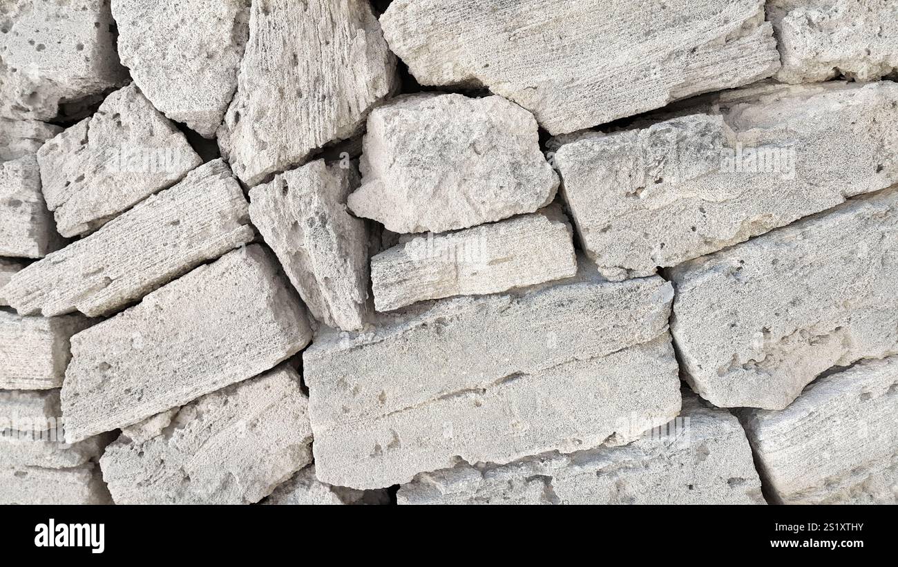 Texture of wall from different shapes stones Stock Photo - Alamy